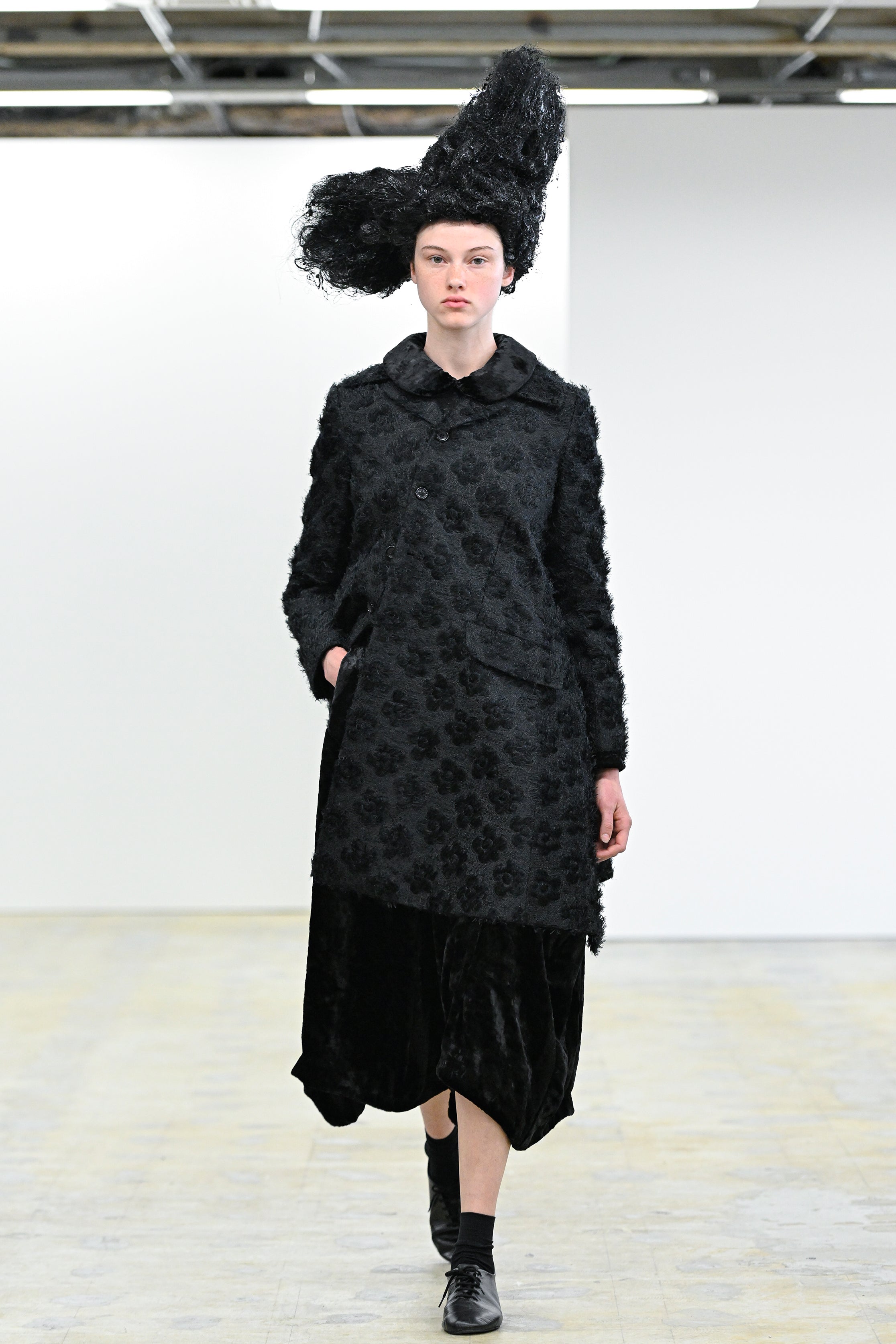 Fashion model wearing a Comme des Garçons Comme des Garçons AW25 outfit