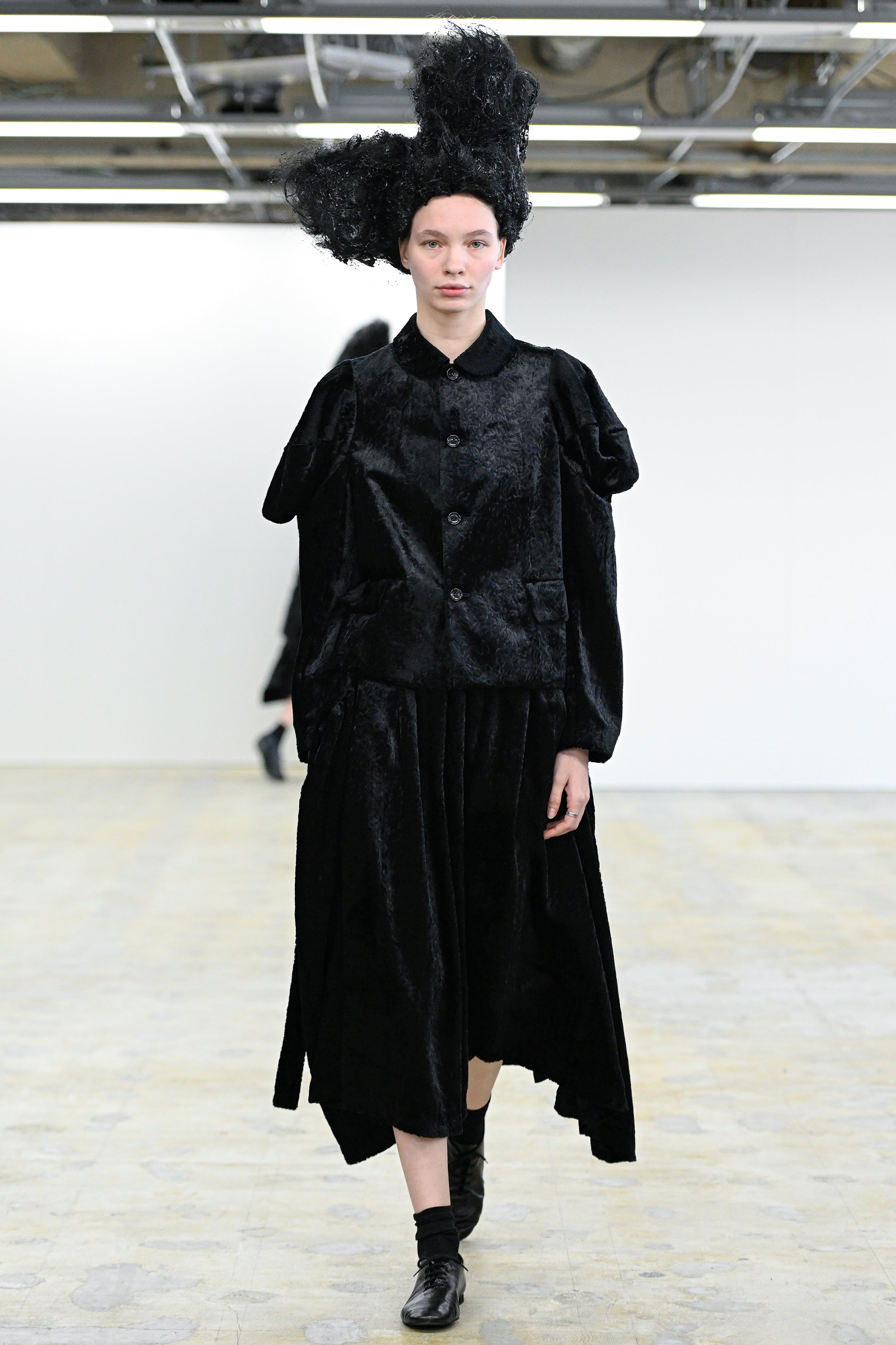 Fashion model wearing a Comme des Garçons Comme des Garçons AW25 outfit