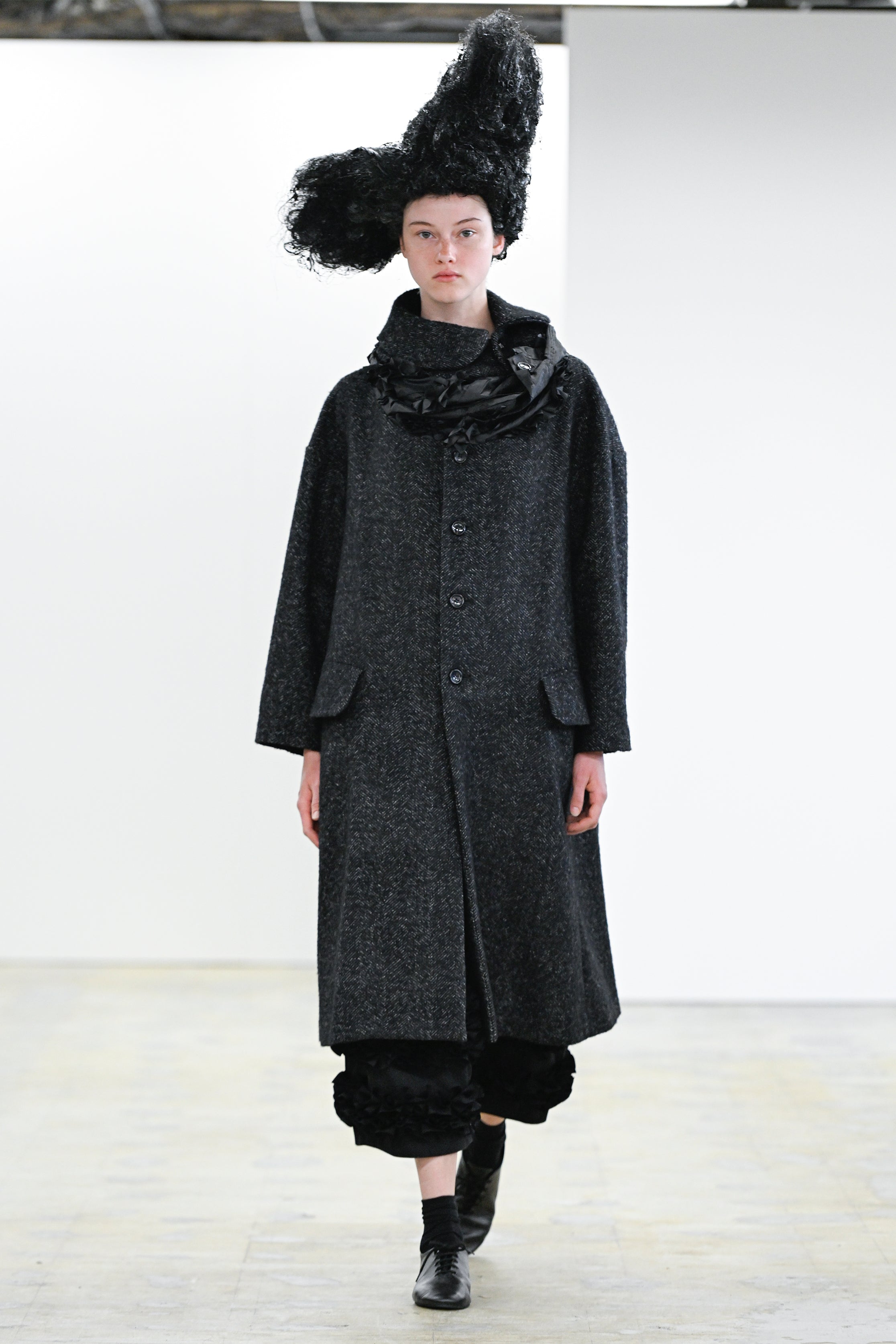 Fashion model wearing a Comme des Garçons Comme des Garçons AW25 outfit