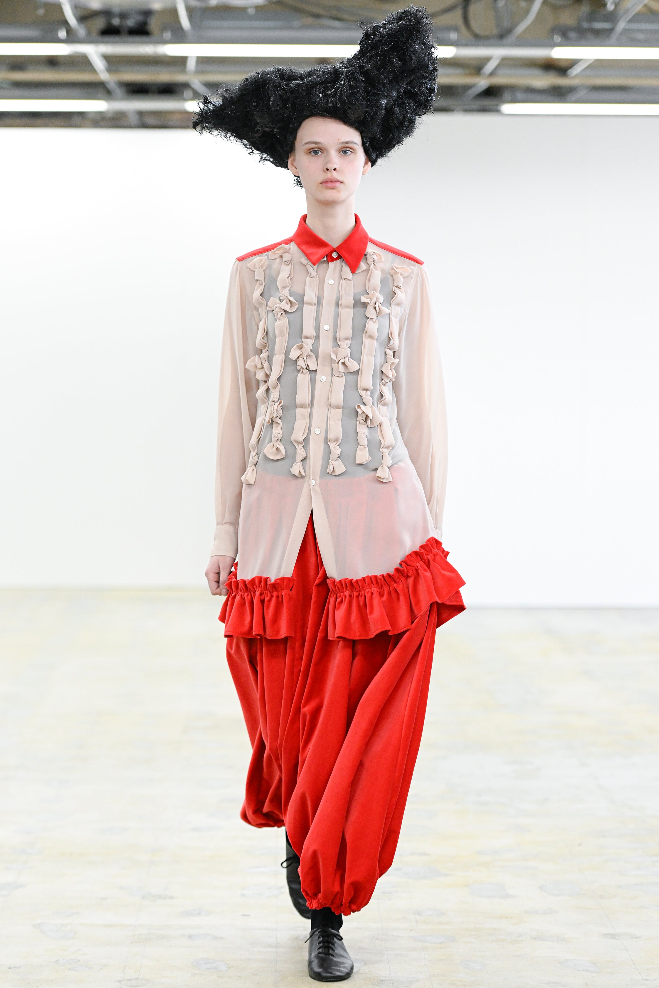 Fashion model wearing a Comme des Garçons Comme des Garçons AW25 outfit