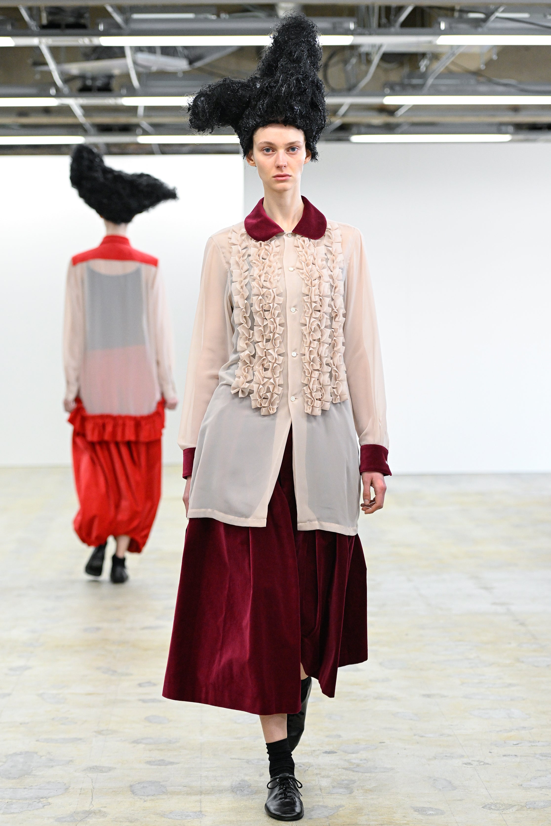 Fashion model wearing a Comme des Garçons Comme des Garçons AW25 outfit