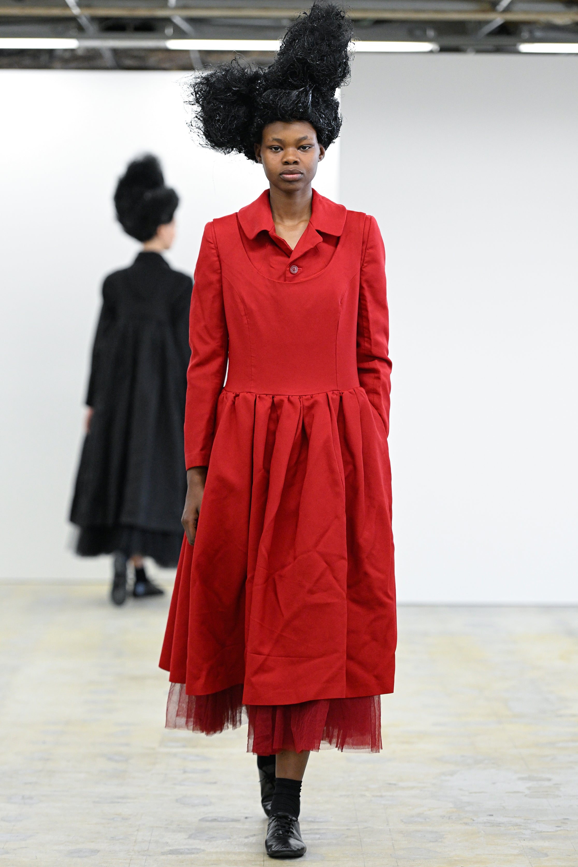 Fashion model wearing a Comme des Garçons Comme des Garçons AW25 outfit