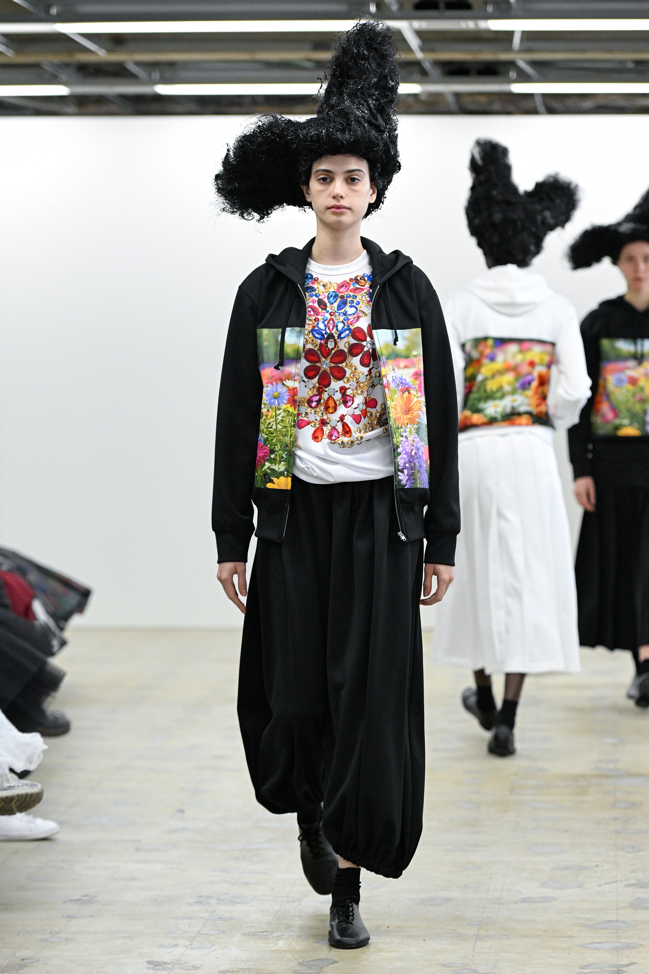 Fashion model wearing a Comme des Garçons Comme des Garçons AW25 outfit