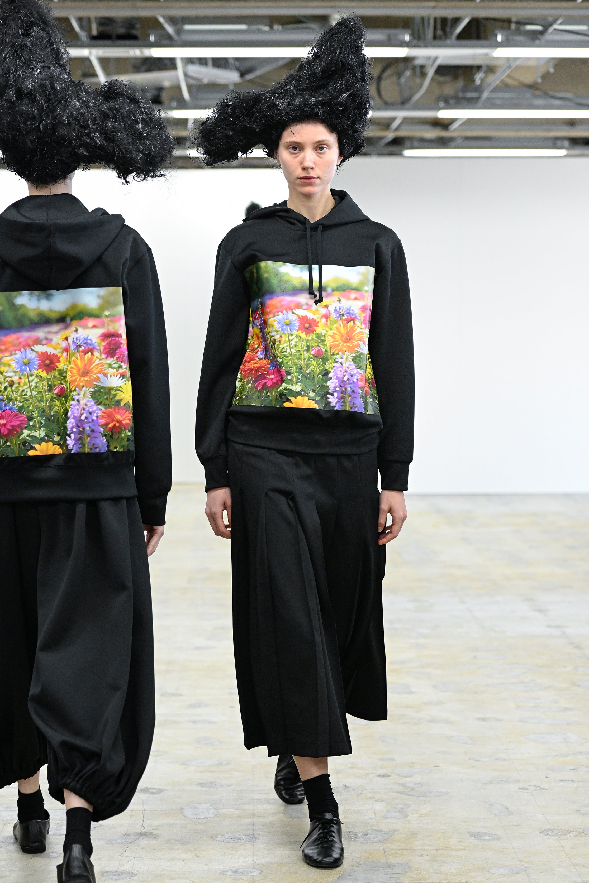 Fashion model wearing a Comme des Garçons Comme des Garçons AW25 outfit