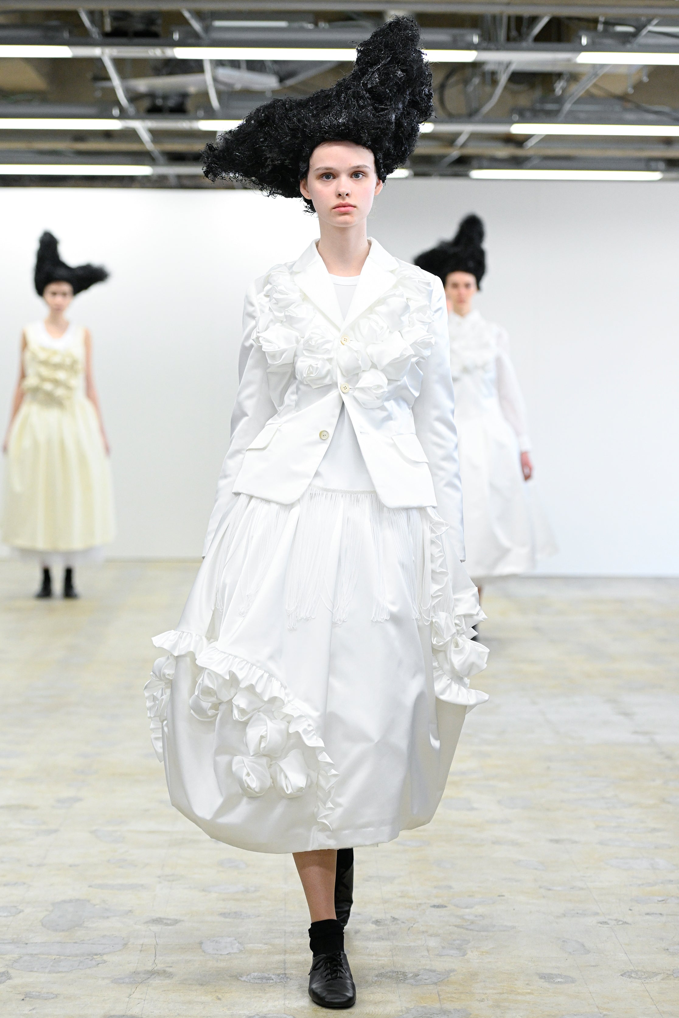 Fashion model wearing a Comme des Garçons Comme des Garçons AW25 outfit
