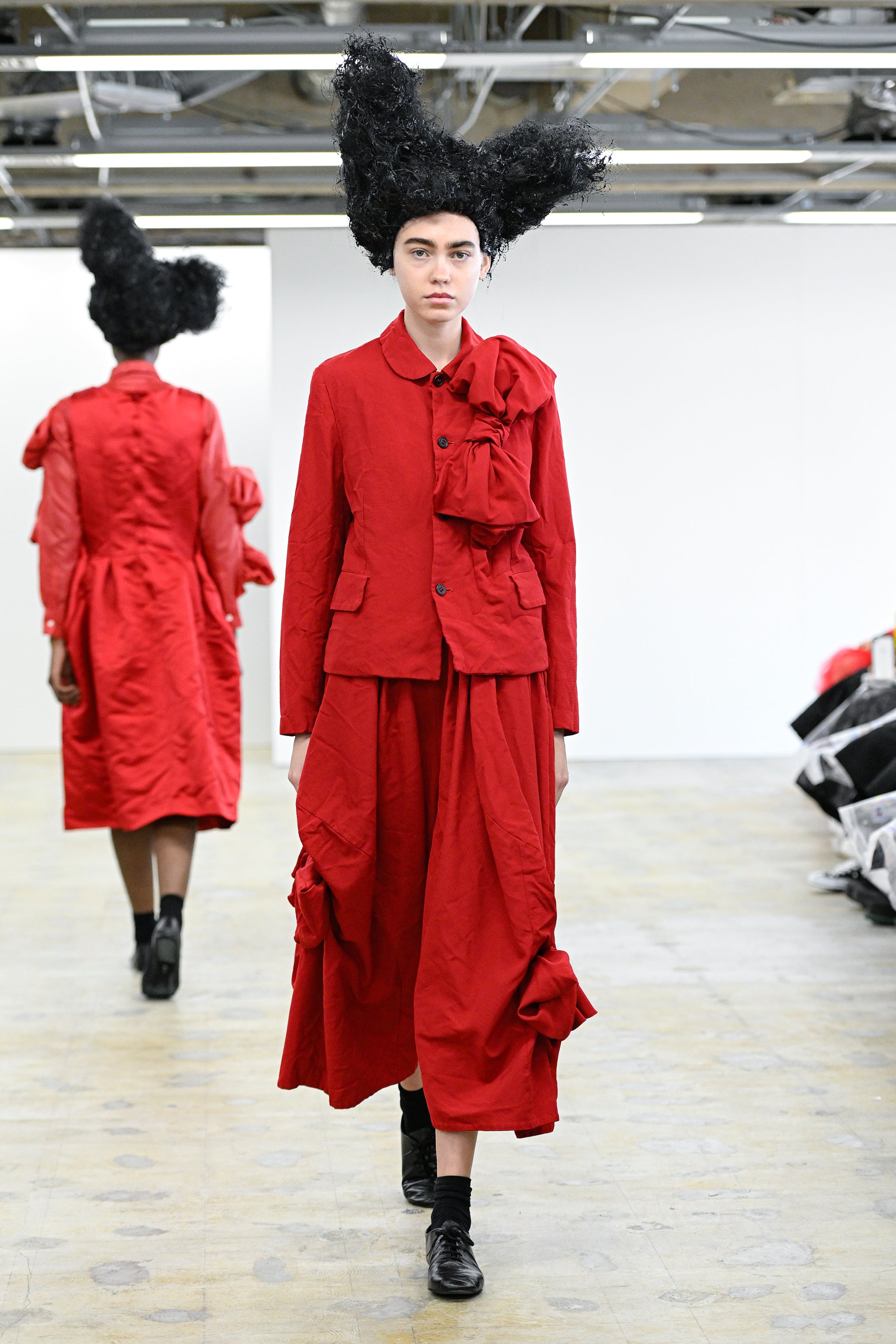 Fashion model wearing a Comme des Garçons Comme des Garçons AW25 outfit