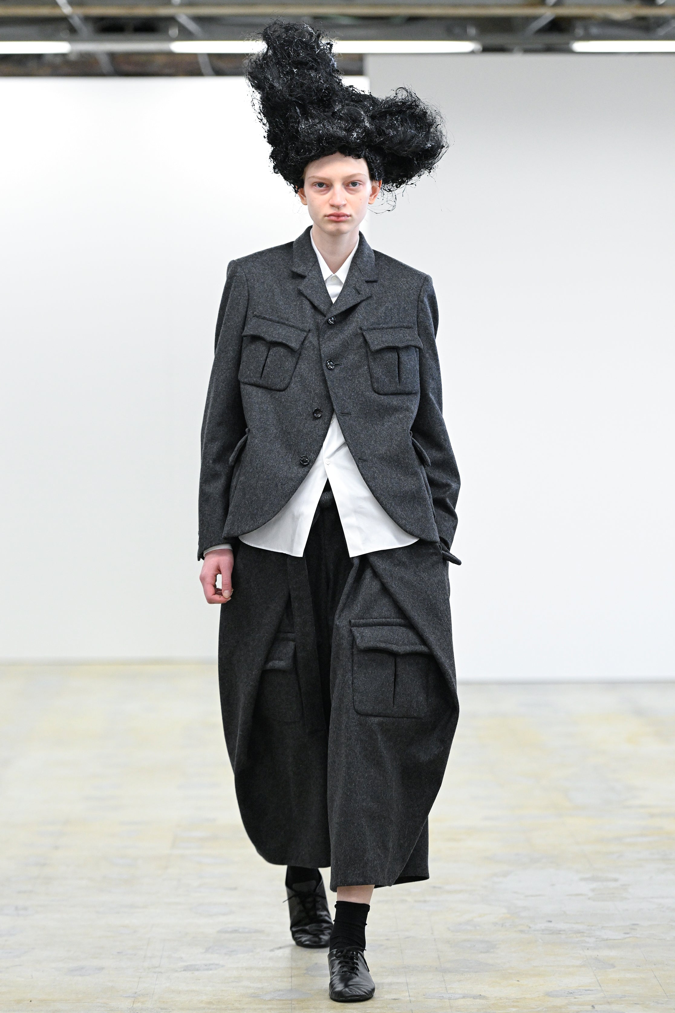 Fashion model wearing a Comme des Garçons Comme des Garçons AW25 outfit