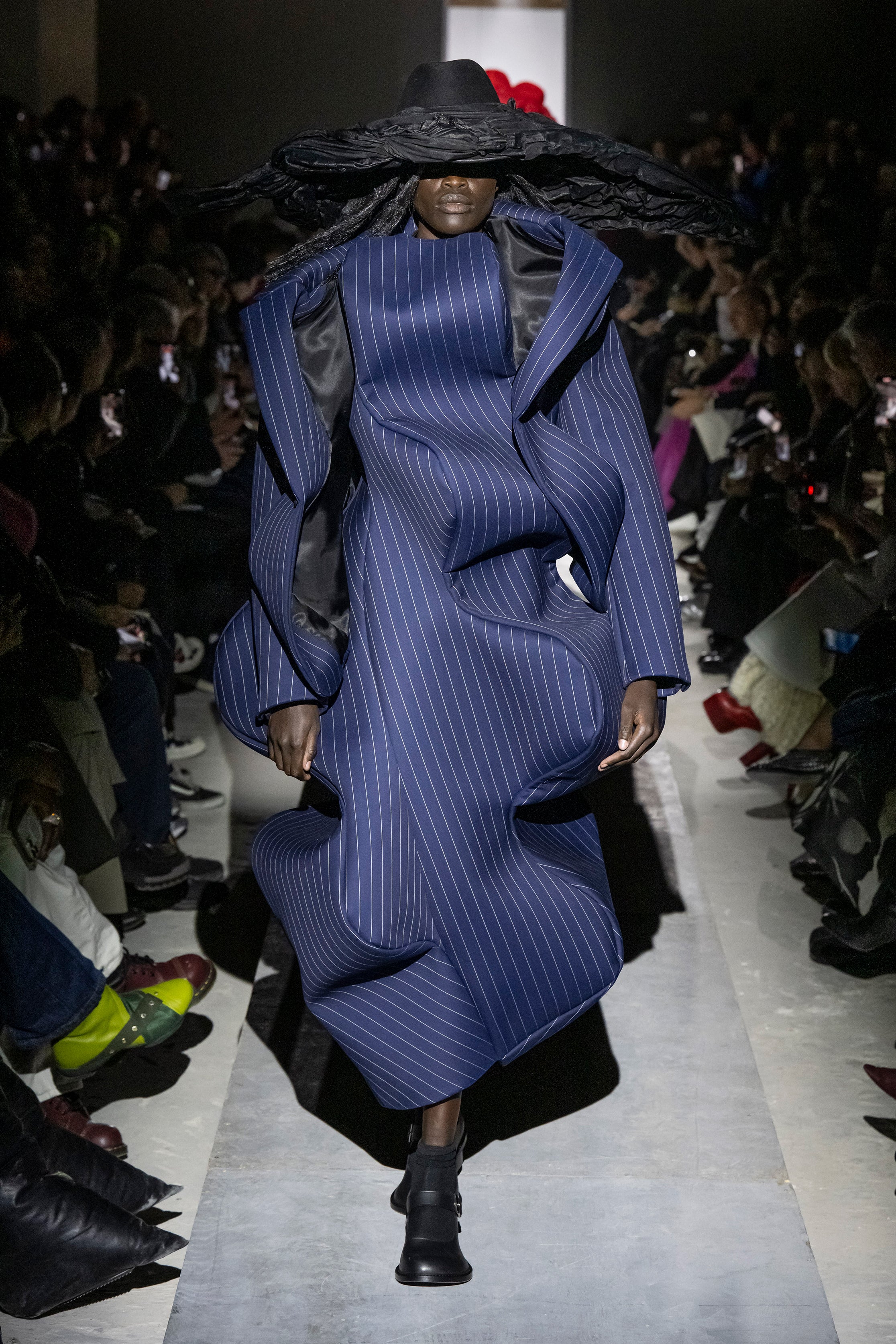 Fashion model wearing a Comme des Garçons AW25 outfit