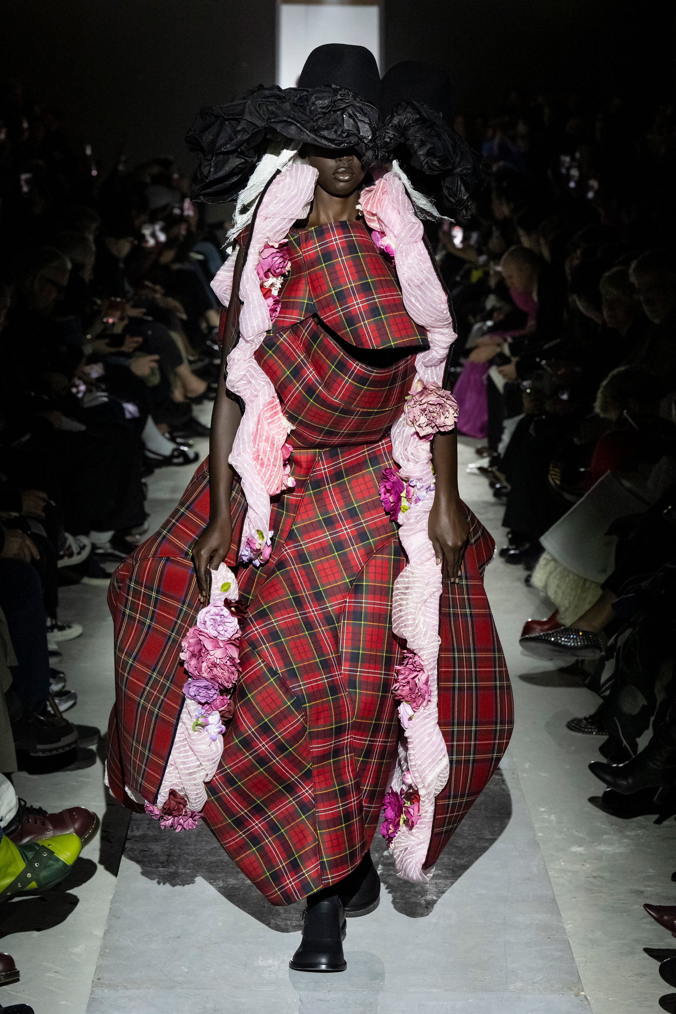 Fashion model wearing a Comme des Garçons AW25 outfit