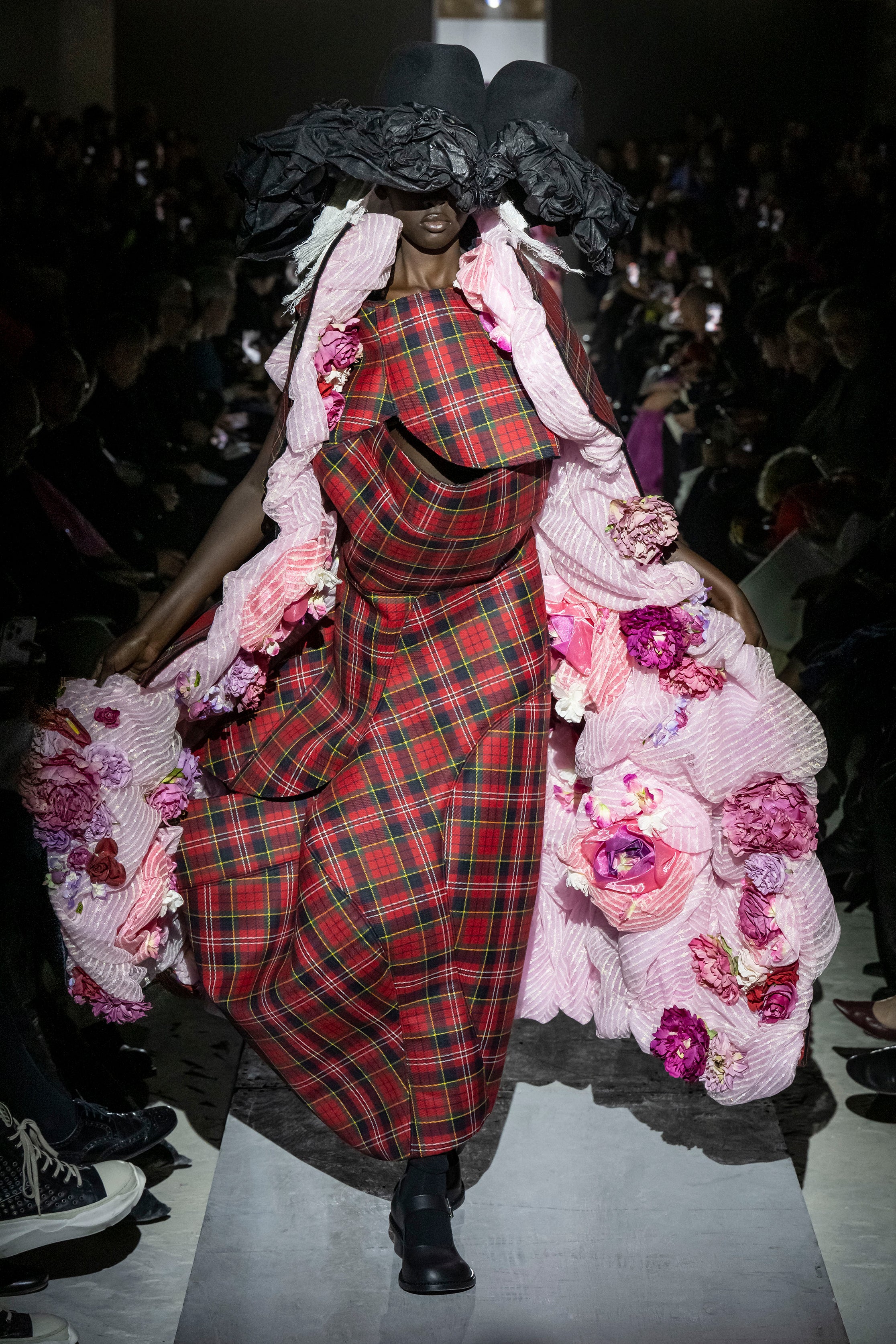 Fashion model wearing a Comme des Garçons AW25 outfit