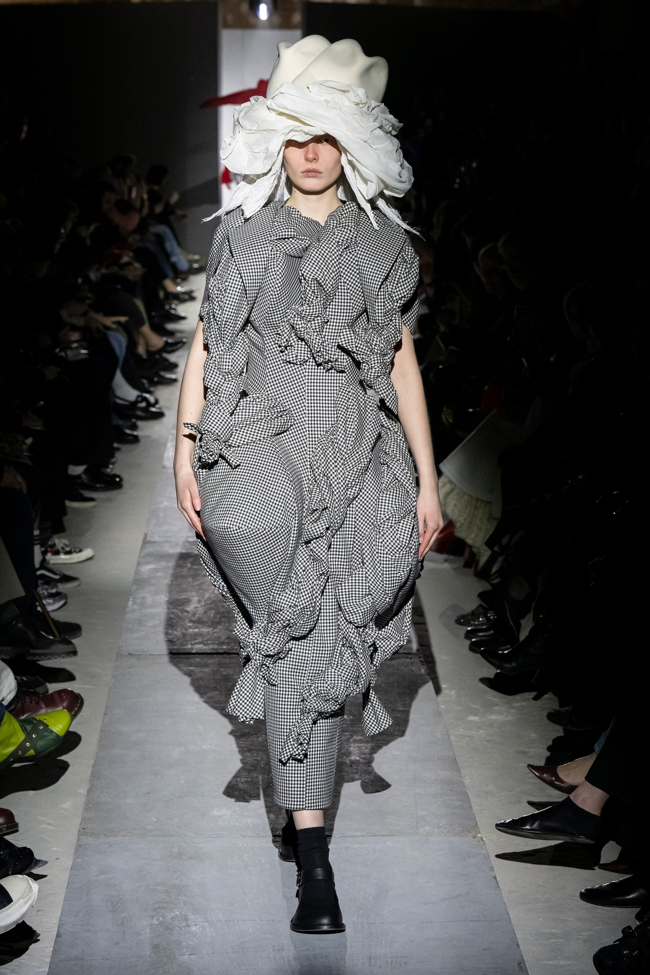 Fashion model wearing a Comme des Garçons AW25 outfit