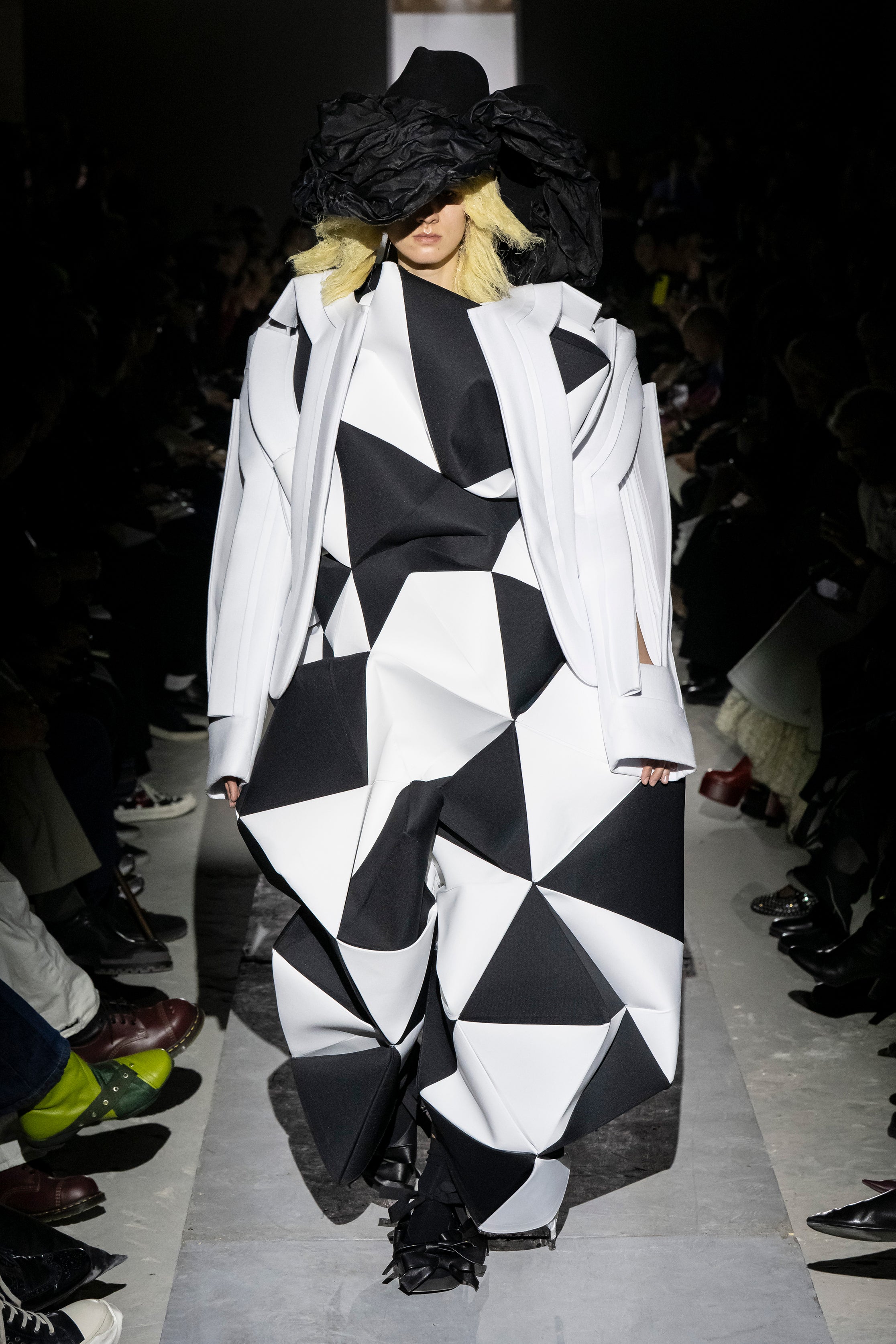 Fashion model wearing a Comme des Garçons AW25 outfit