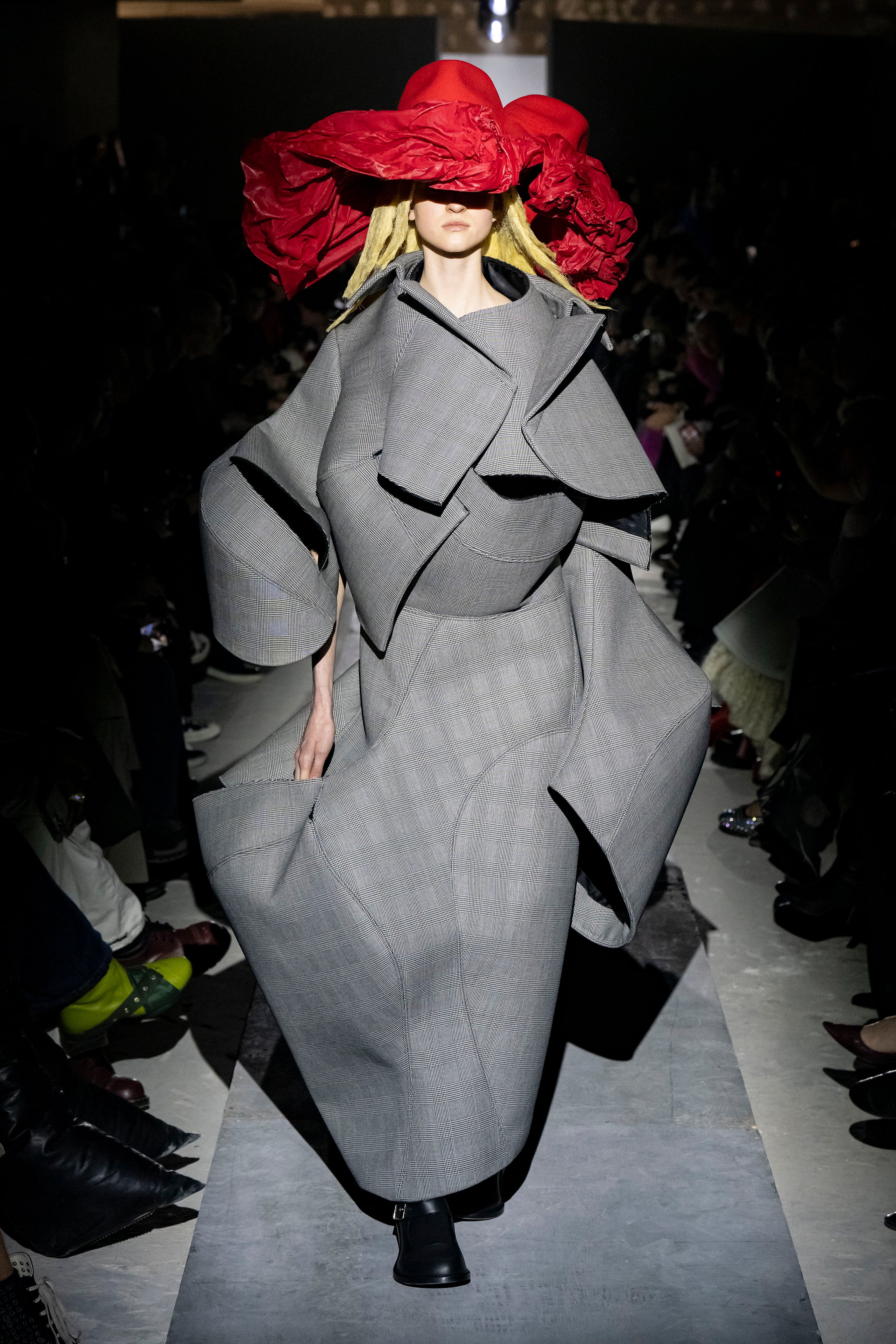 Fashion model wearing a Comme des Garçons AW25 outfit