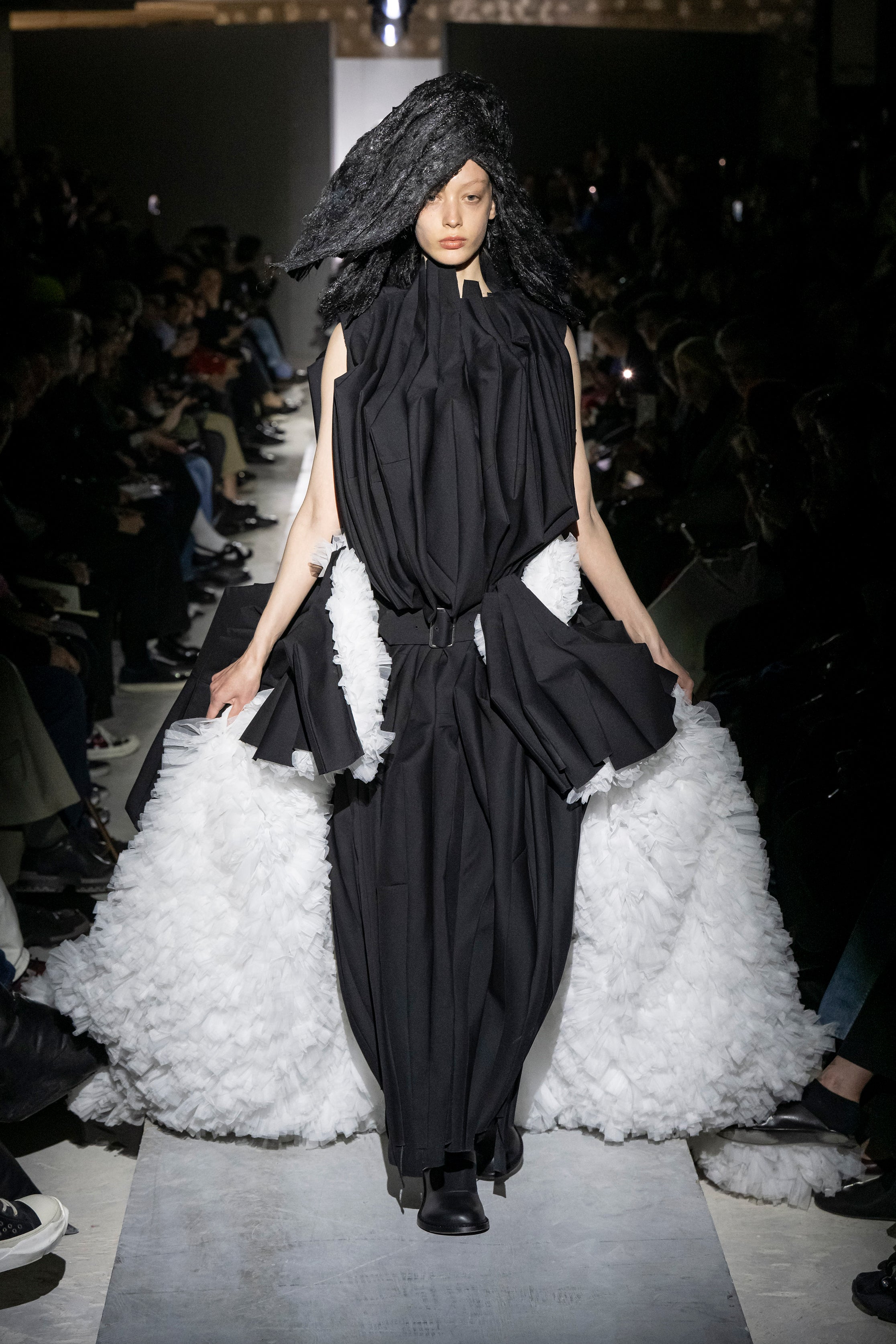 Fashion model wearing a Comme des Garçons AW25 outfit