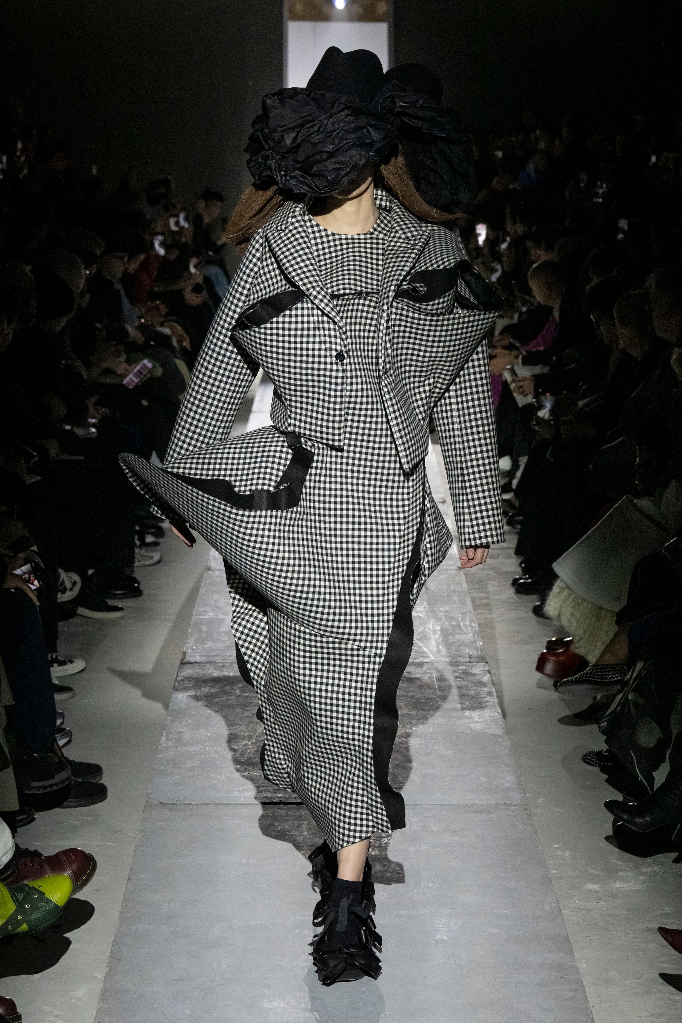 Fashion model wearing a Comme des Garçons AW25 outfit