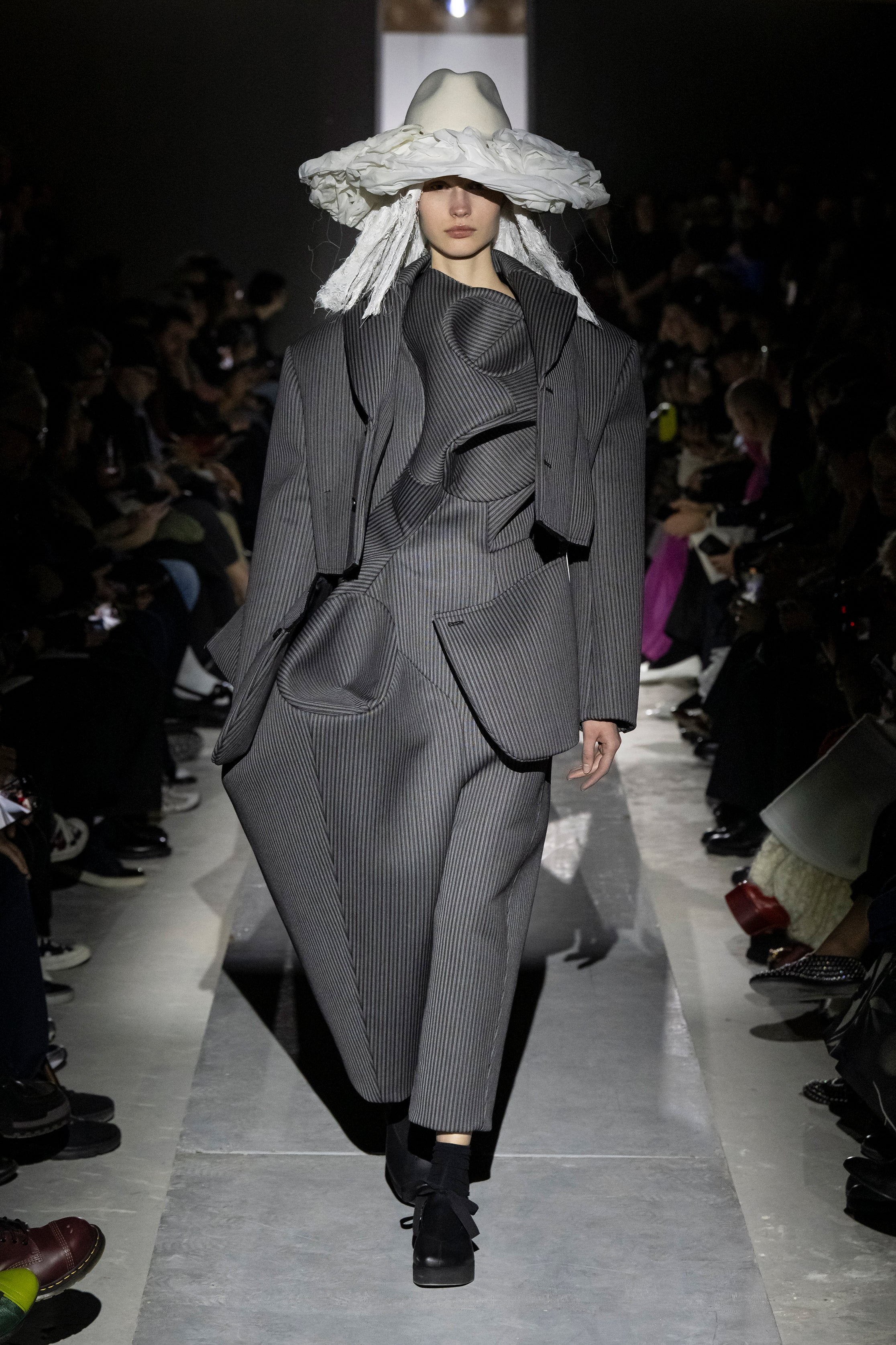Fashion model wearing a Comme des Garçons AW25 outfit