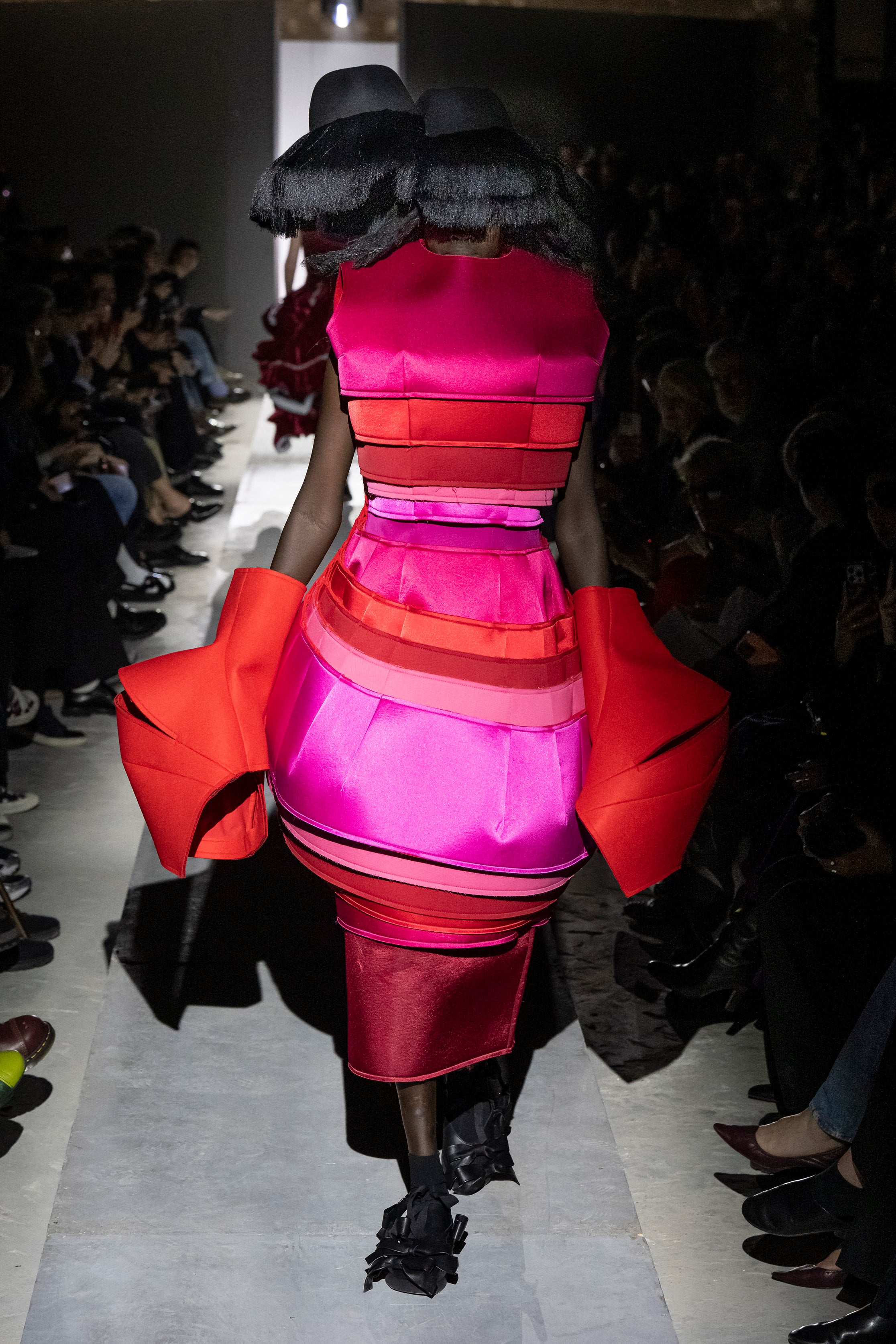 Fashion model wearing a Comme des Garçons AW25 outfit