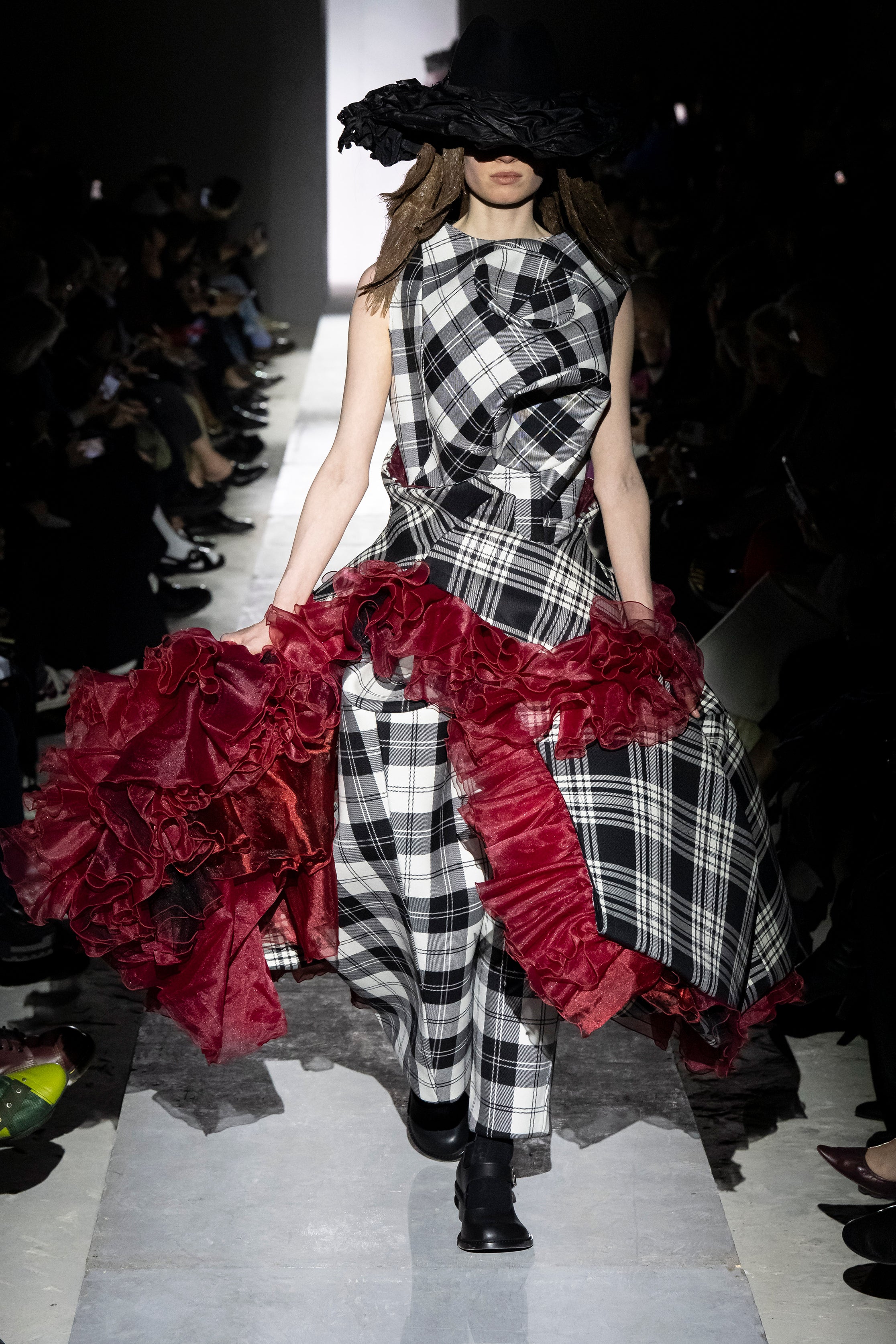 Fashion model wearing a Comme des Garçons AW25 outfit