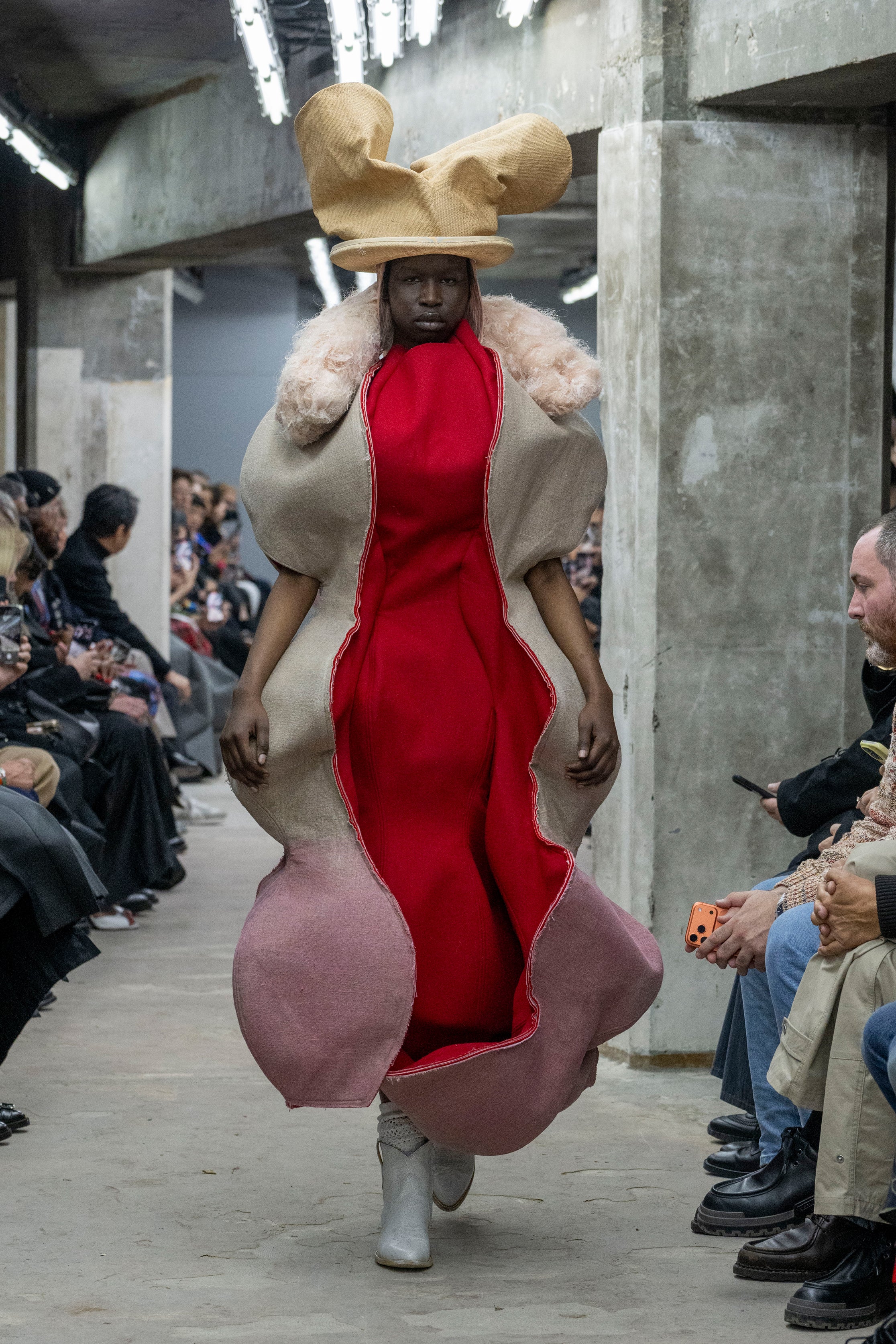 Fashion model wearing a Comme des Garçons SS26 outfit