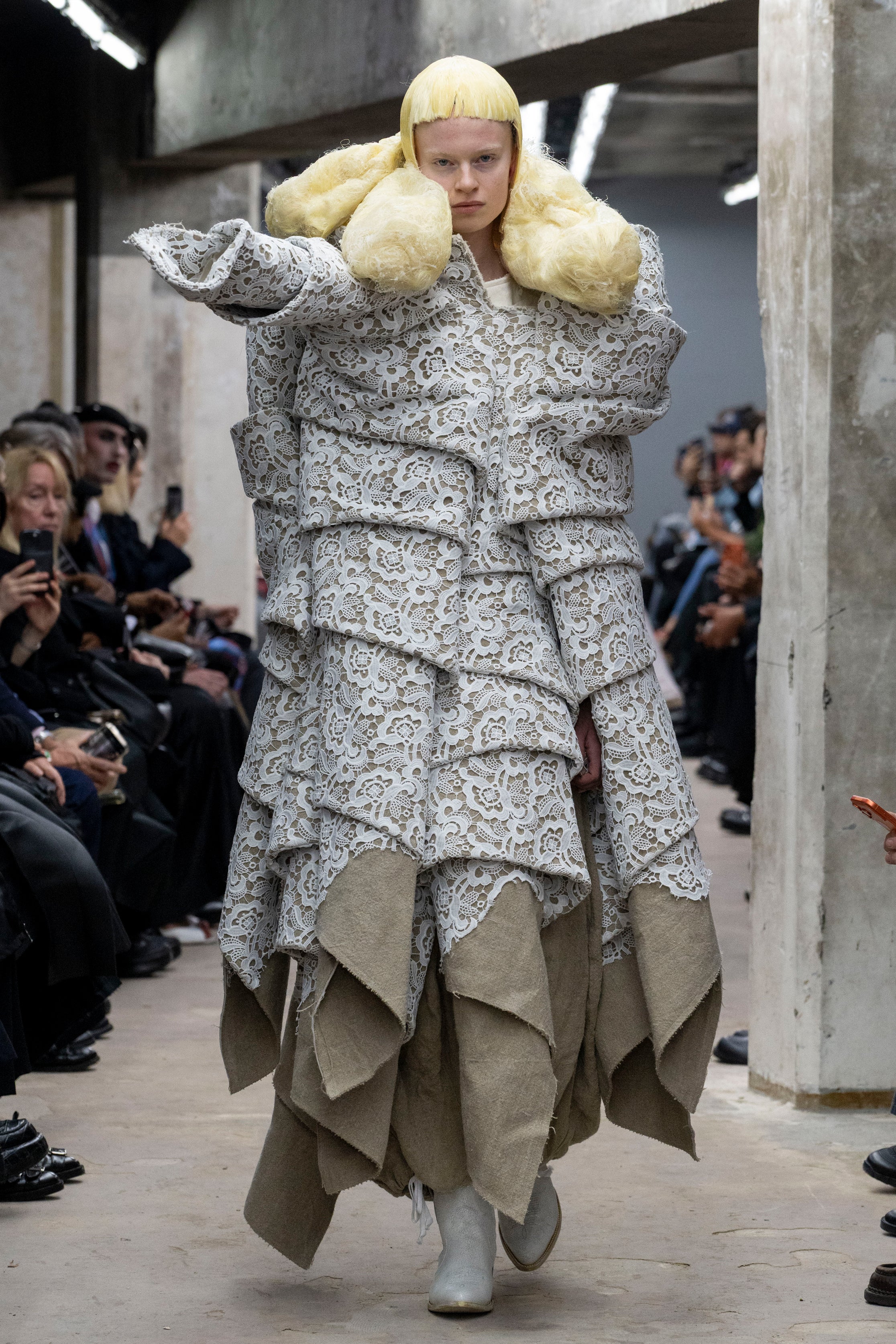 Fashion model wearing a Comme des Garçons SS26 outfit