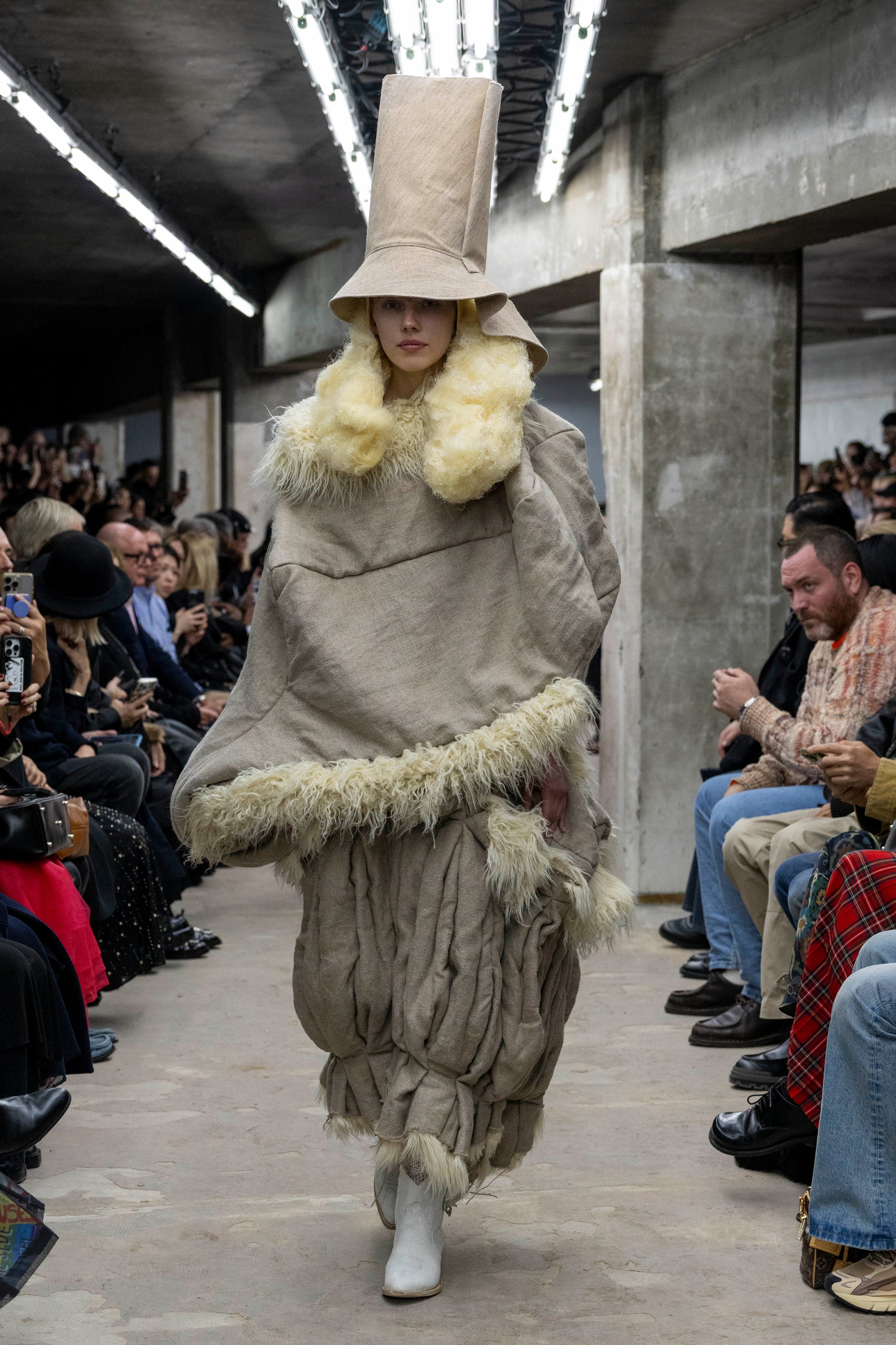 Fashion model wearing a Comme des Garçons SS26 outfit
