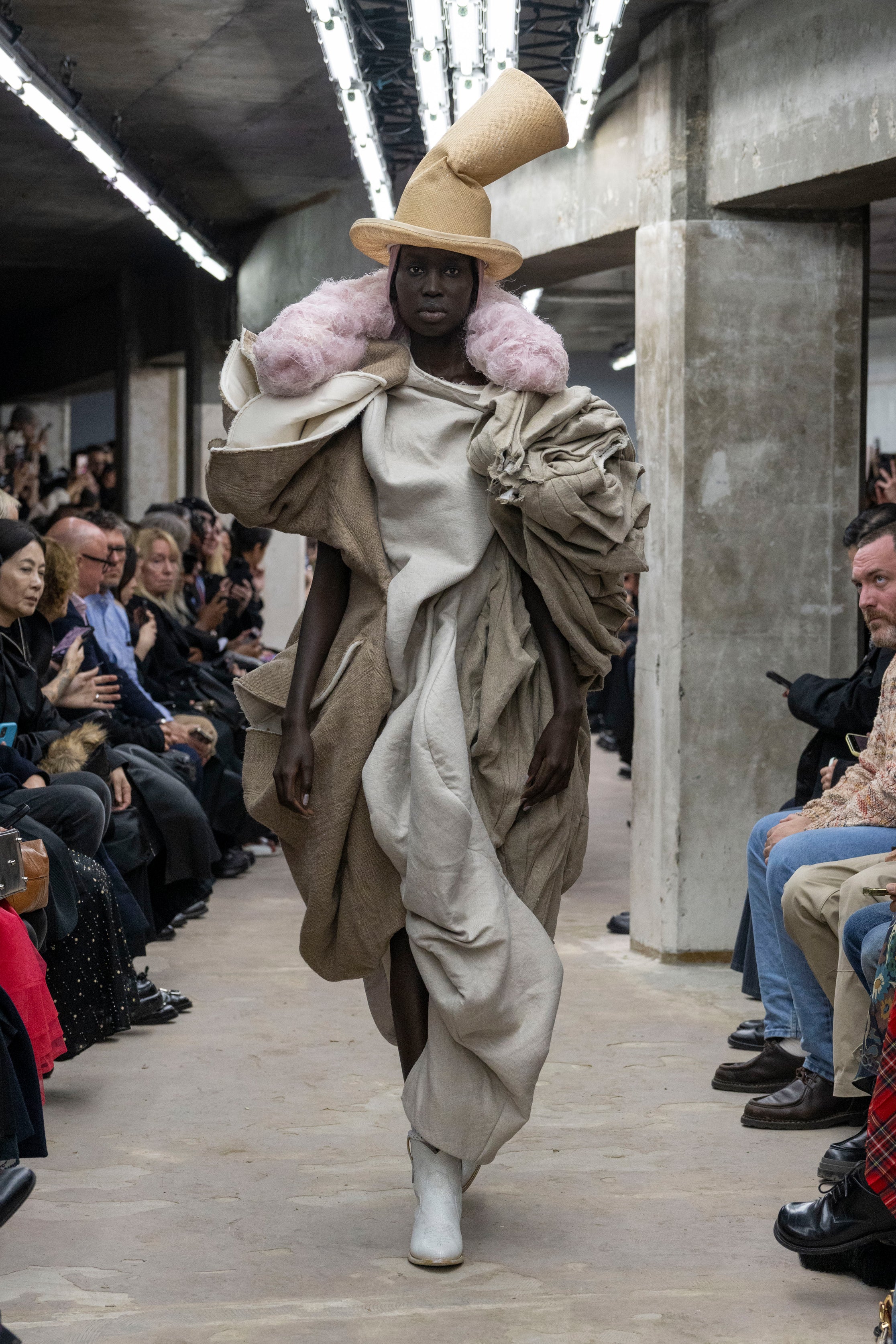 Fashion model wearing a Comme des Garçons SS26 outfit