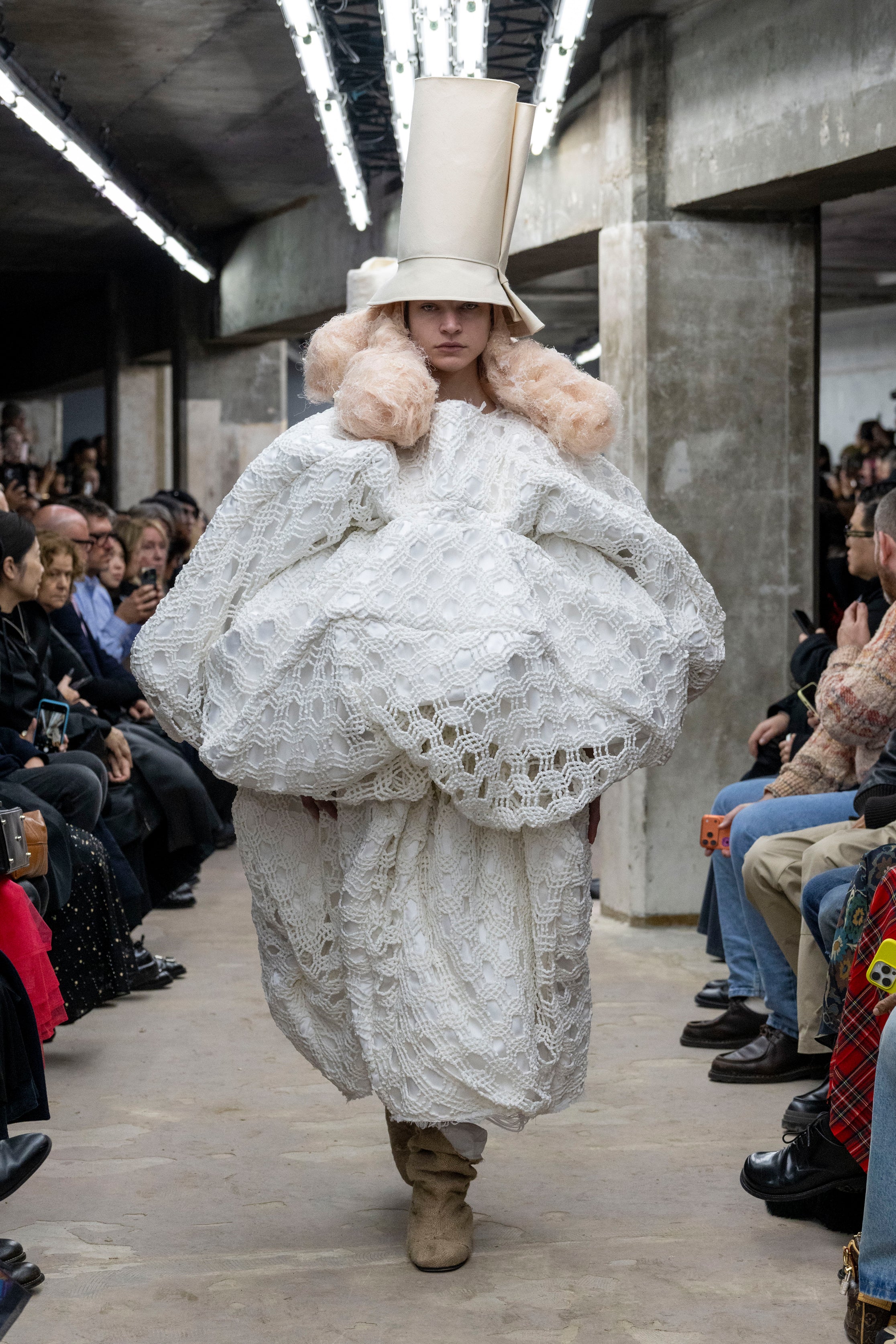 Fashion model wearing a Comme des Garçons SS26 outfit