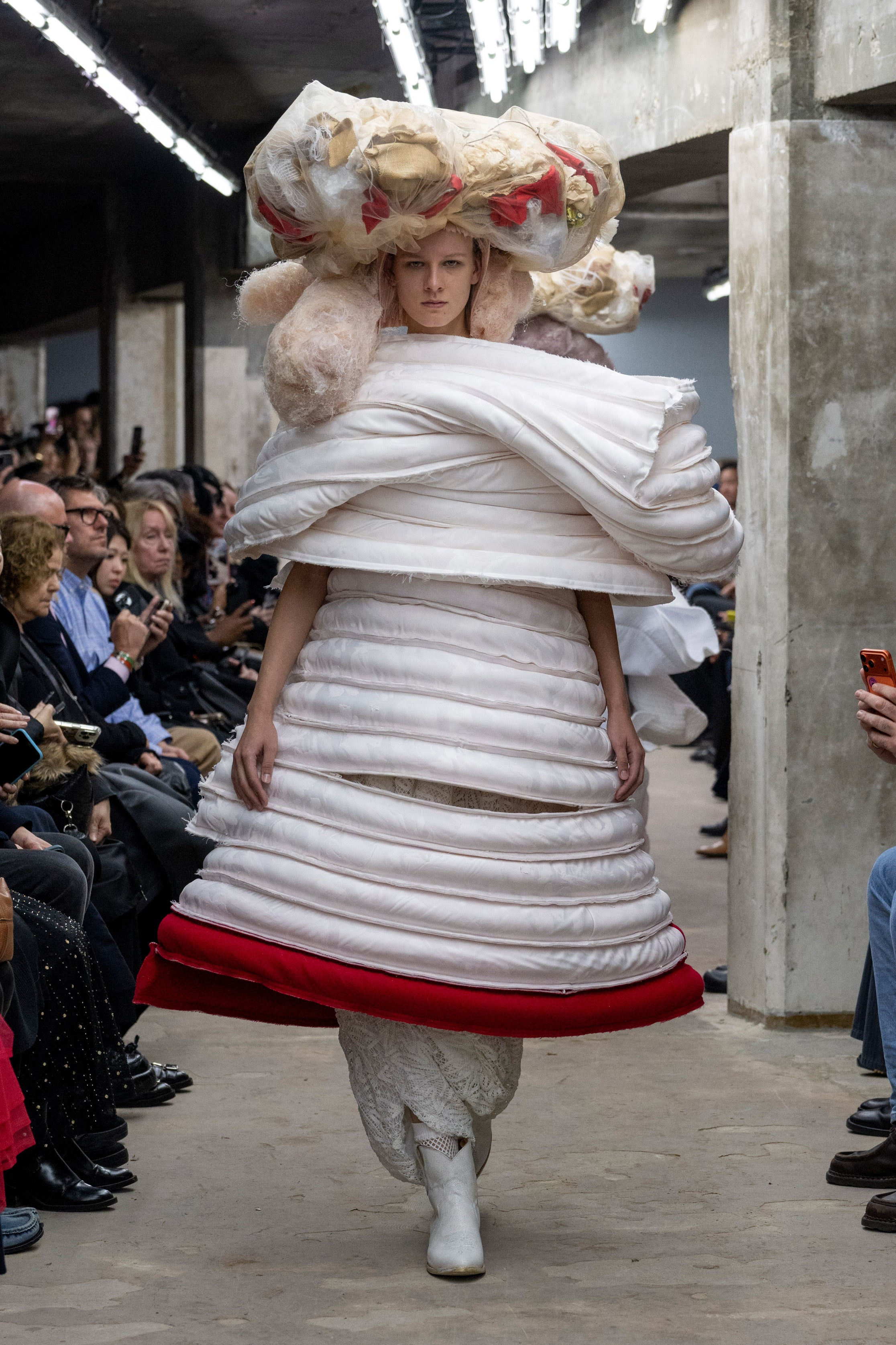 Fashion model wearing a Comme des Garçons SS26 outfit