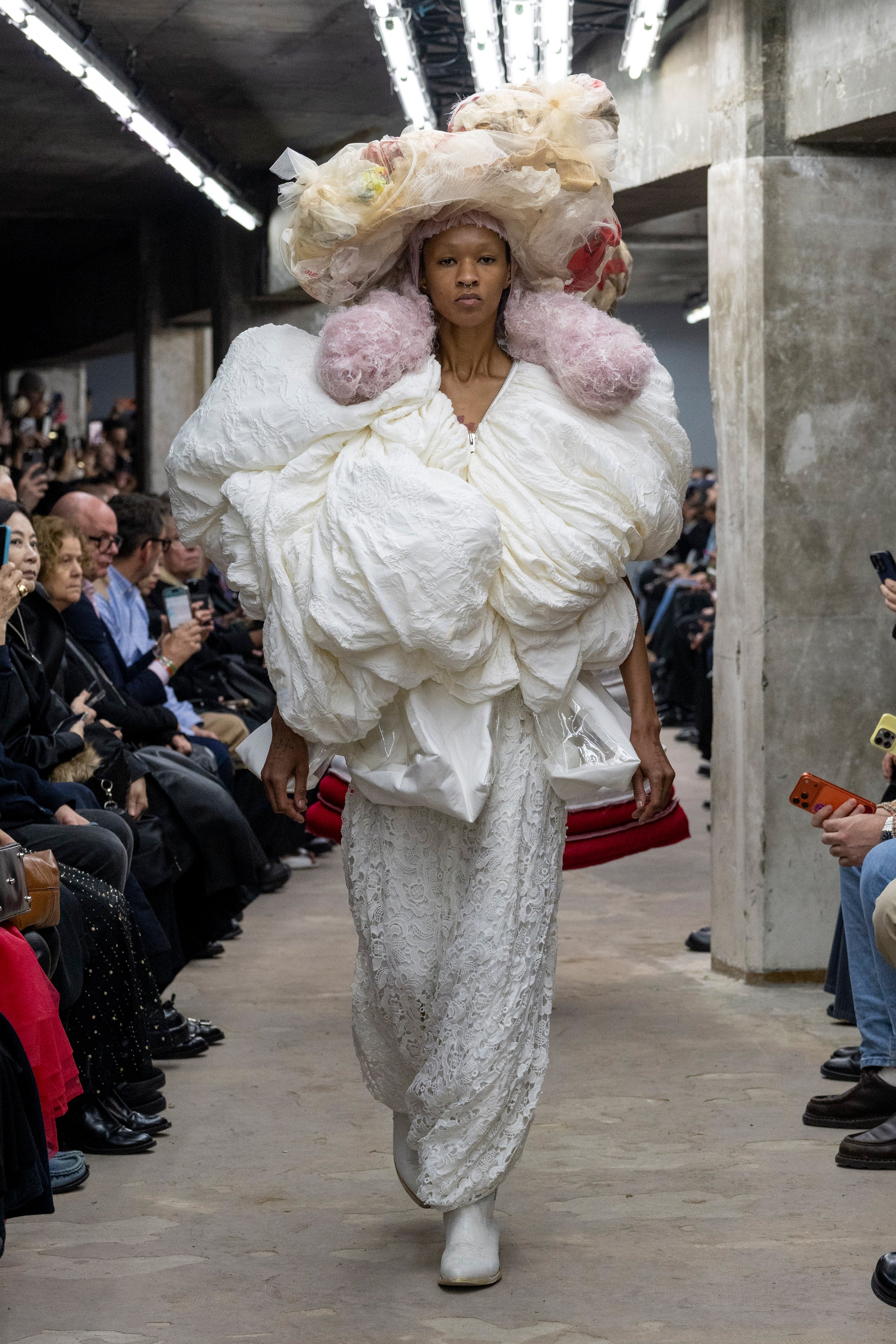 Fashion model wearing a Comme des Garçons SS26 outfit
