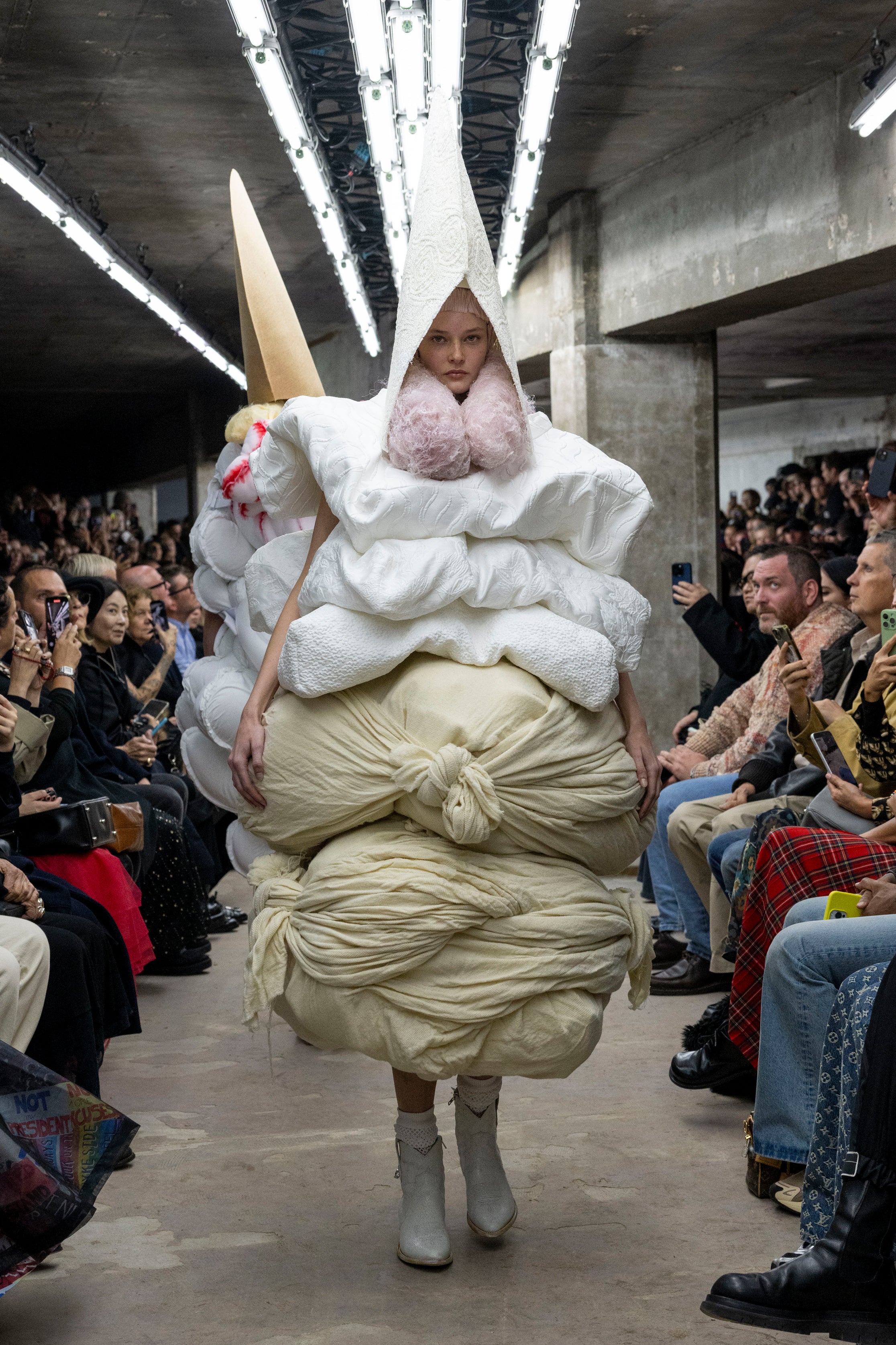 Fashion model wearing a Comme des Garçons SS26 outfit