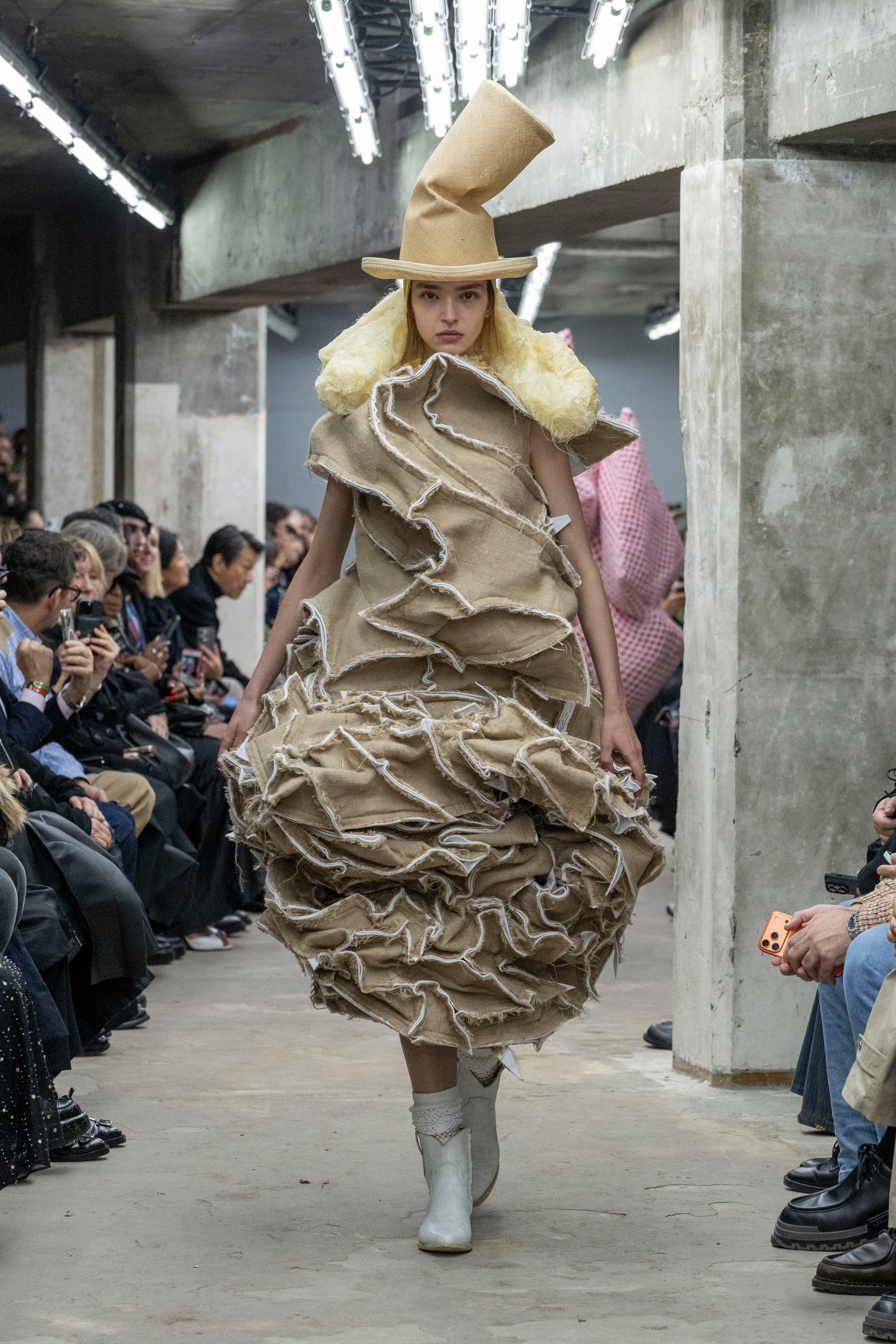 Fashion model wearing a Comme des Garçons SS26 outfit