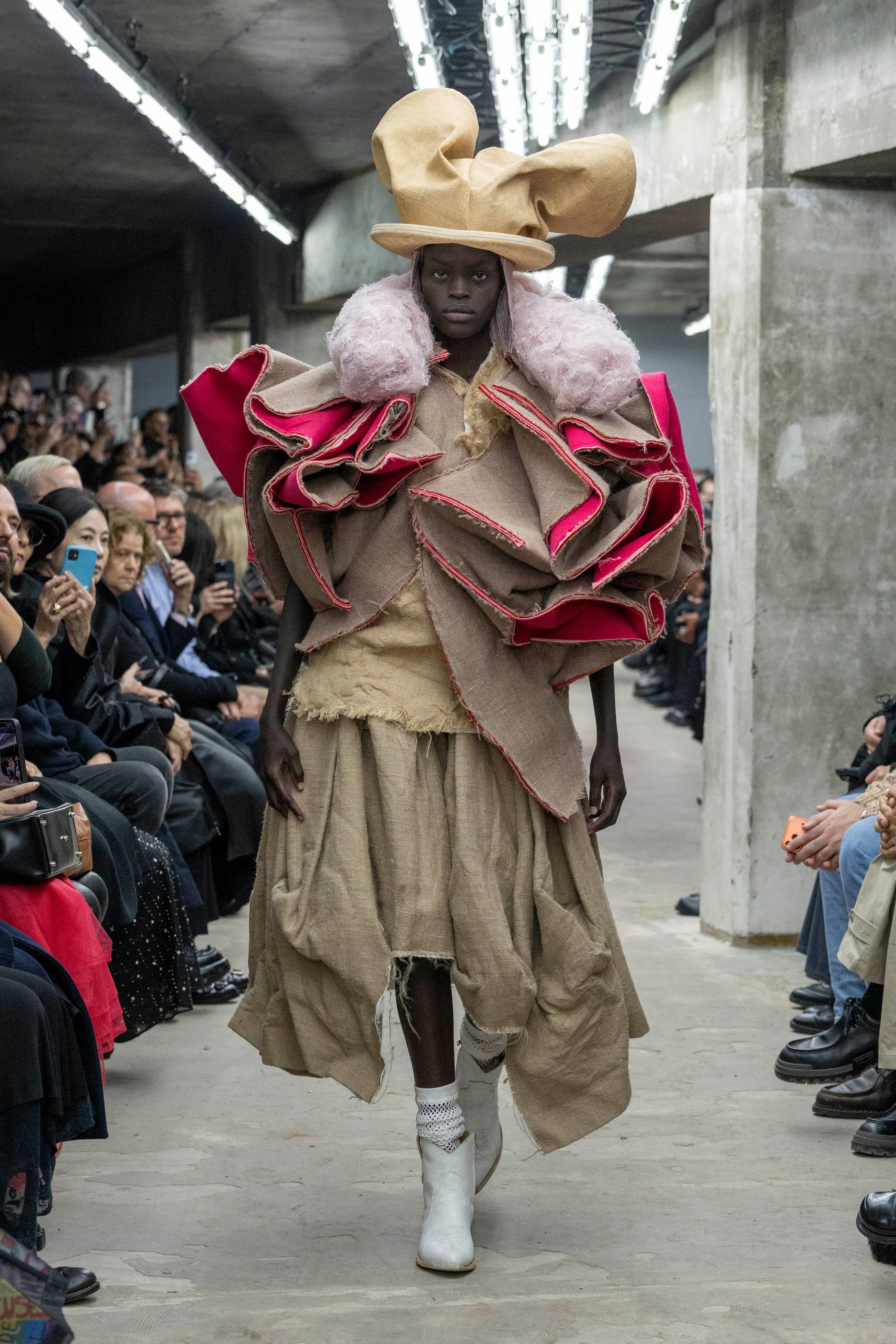 Fashion model wearing a Comme des Garçons SS26 outfit
