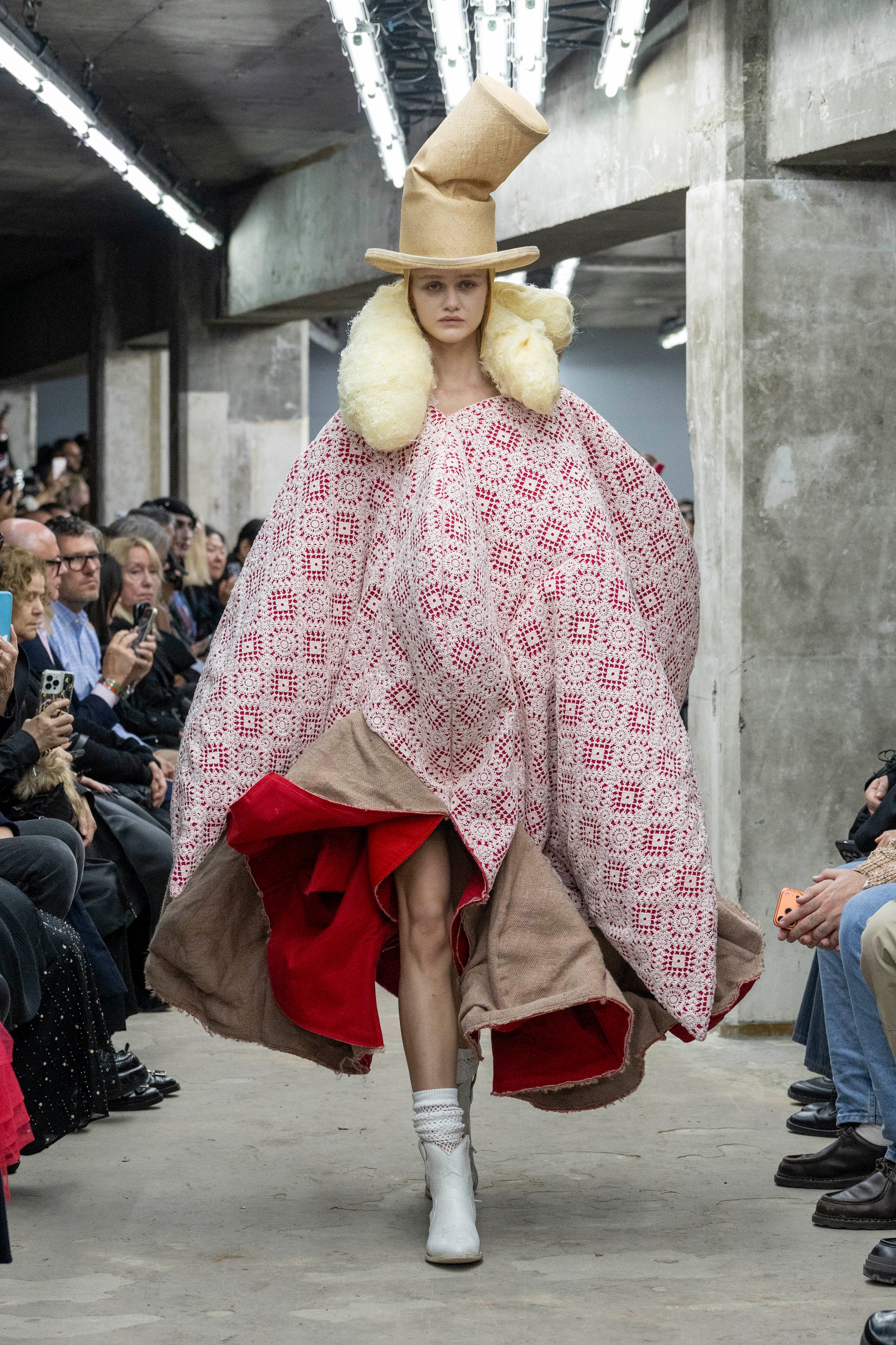 Fashion model wearing a Comme des Garçons SS26 outfit