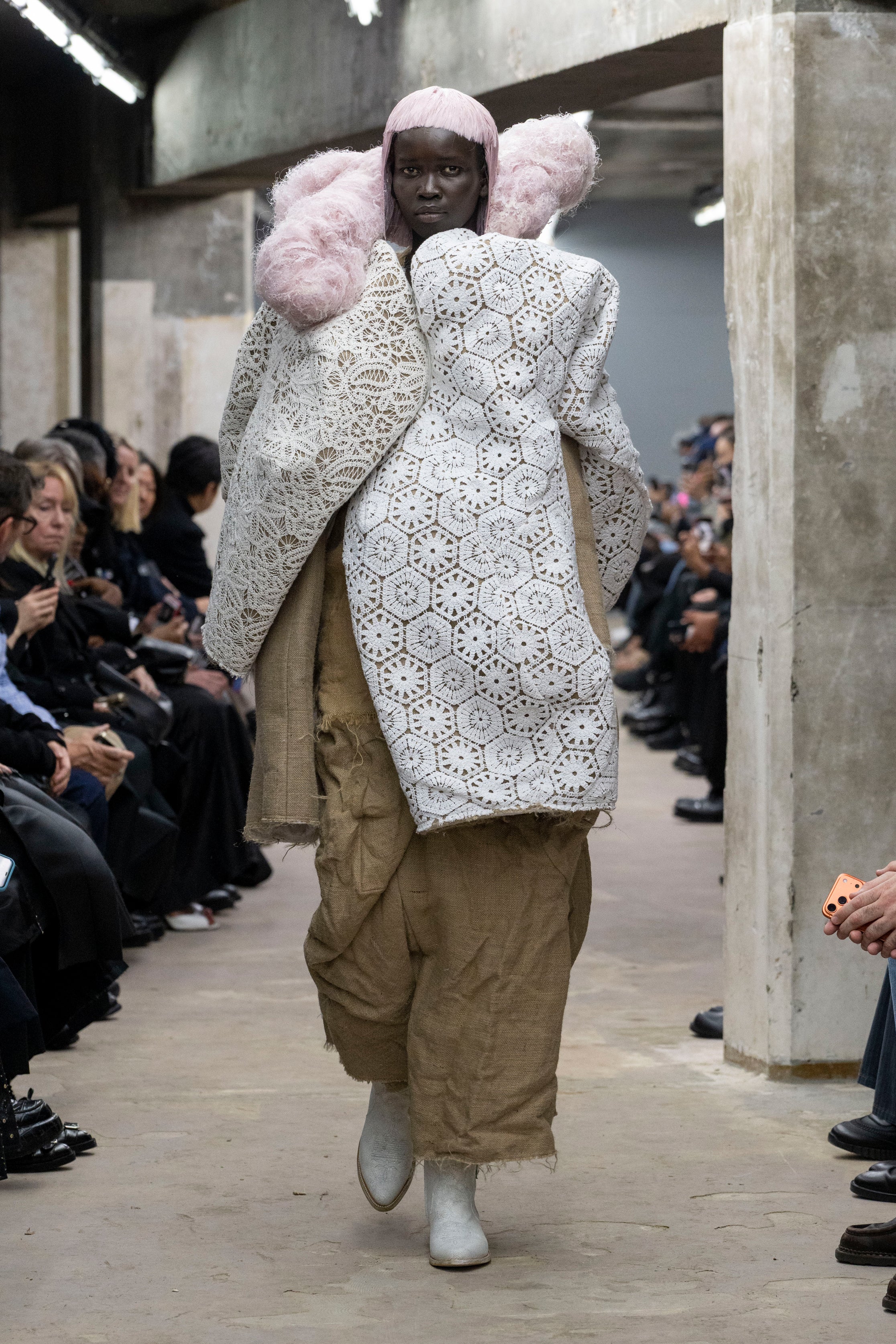 Fashion model wearing a Comme des Garçons SS26 outfit