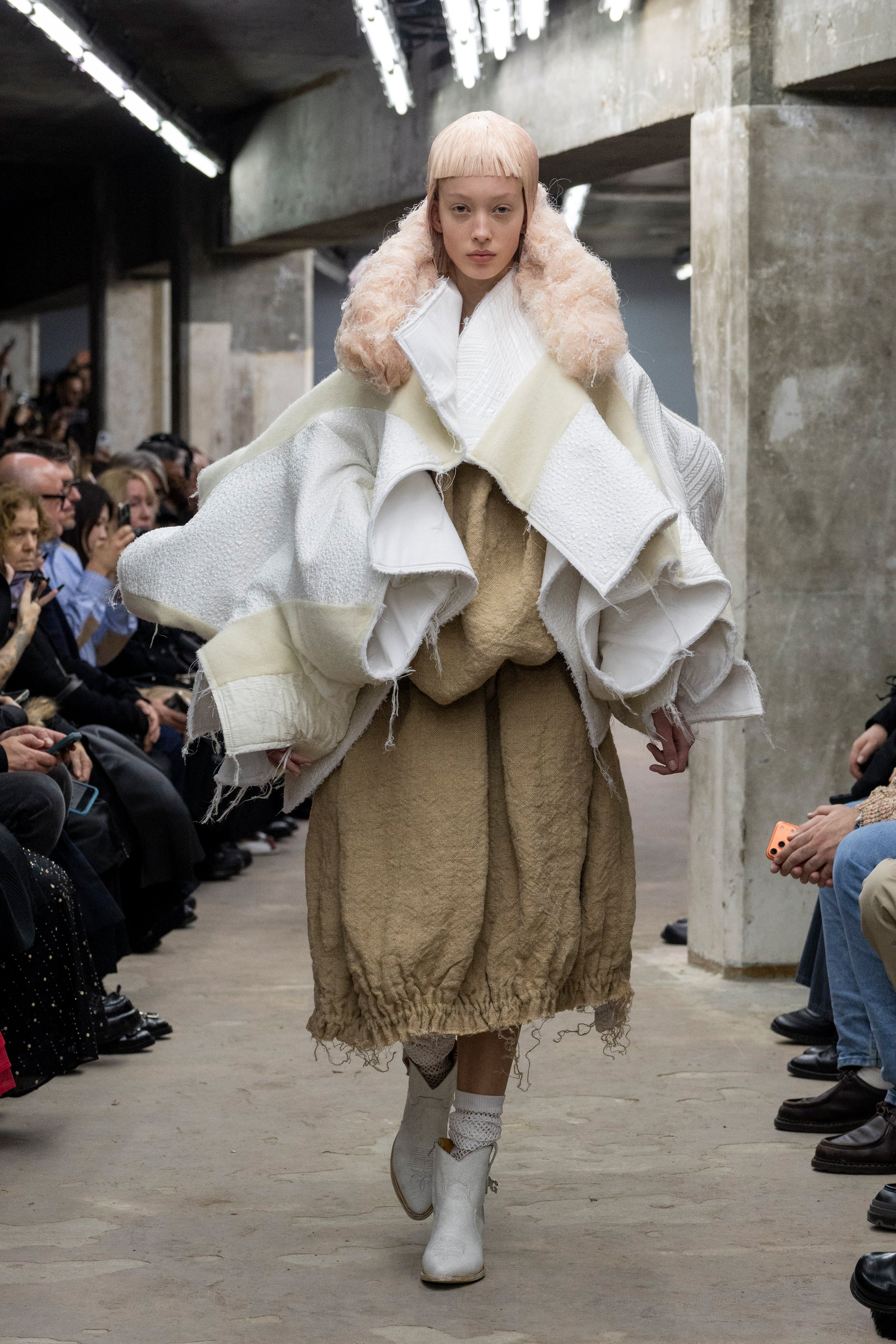 Fashion model wearing a Comme des Garçons SS26 outfit