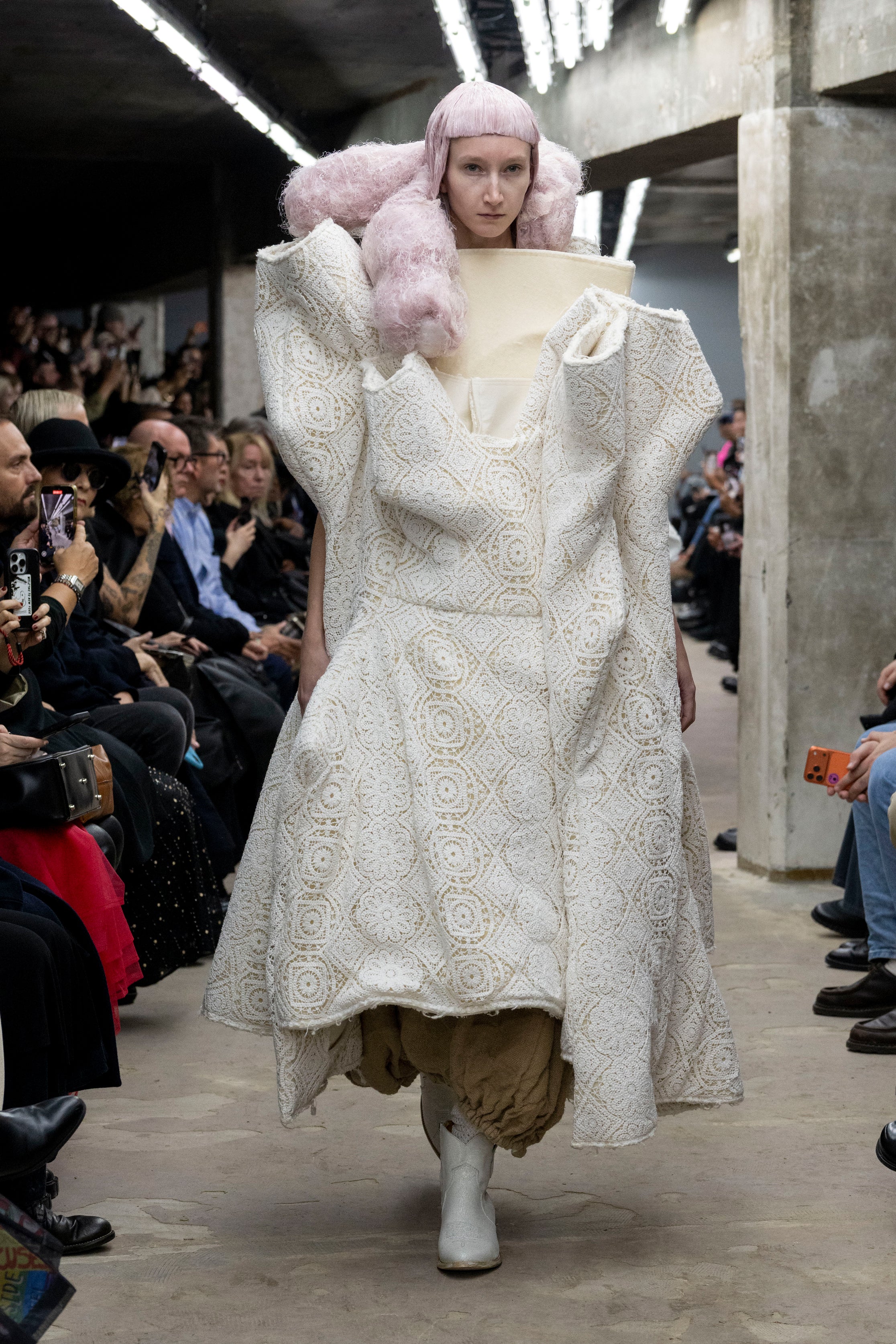 Fashion model wearing a Comme des Garçons SS26 outfit