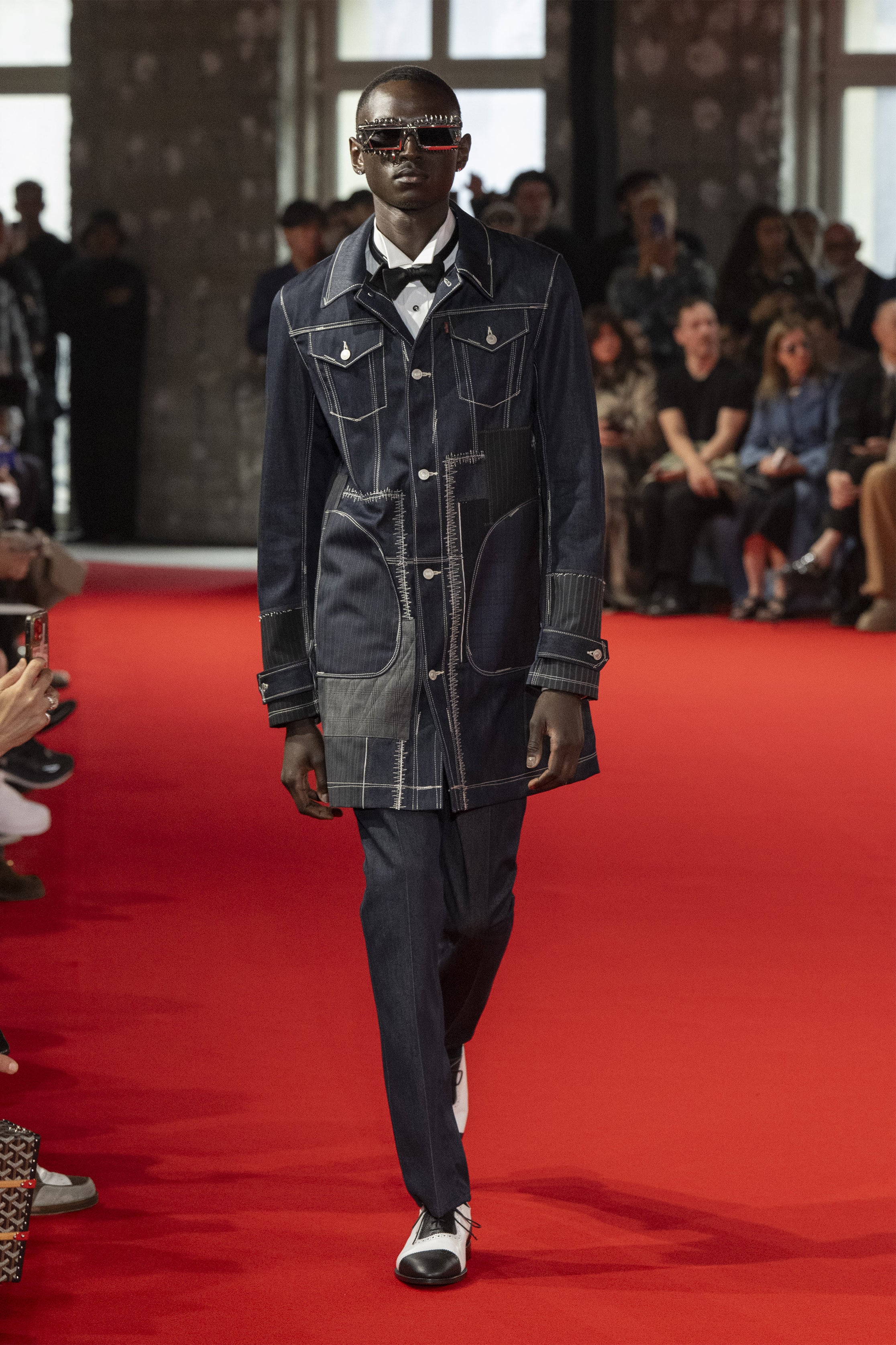 Fashion model wearing a JUNYA WATANABE MAN SS25 outfit