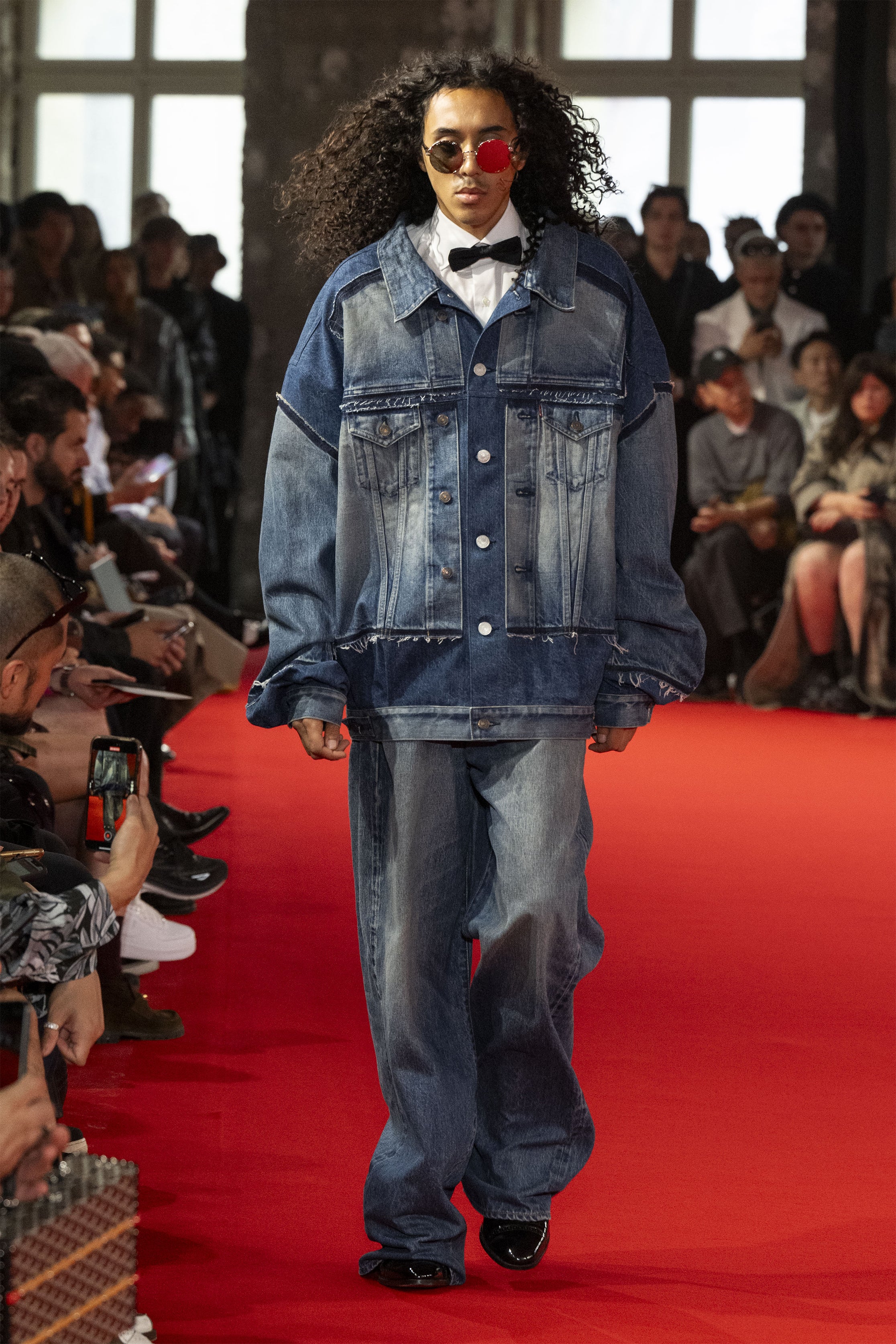 Fashion model wearing a JUNYA WATANABE MAN SS25 outfit