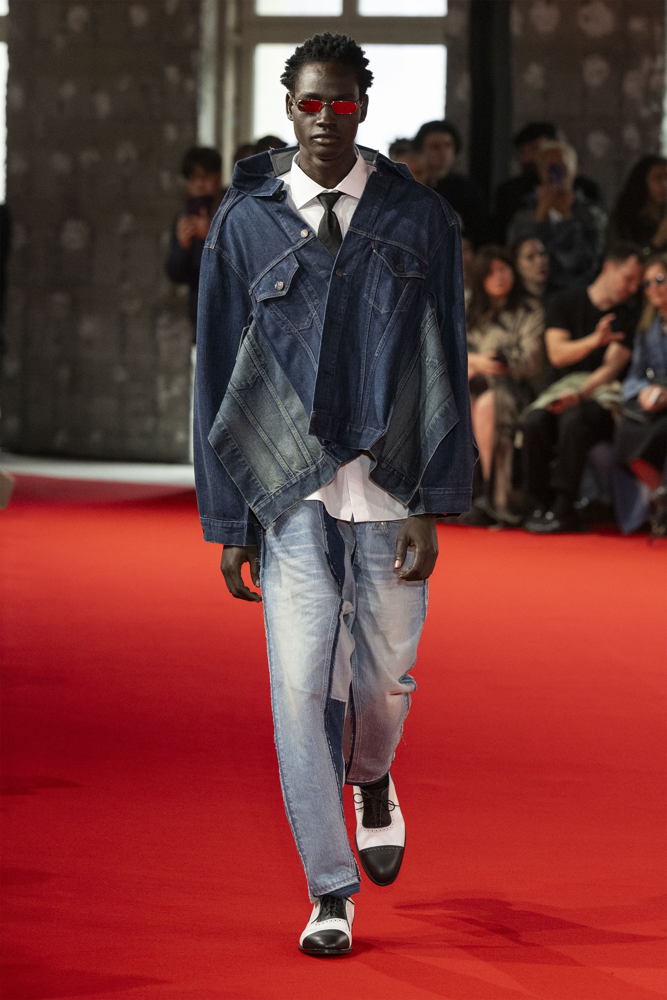 Fashion model wearing a JUNYA WATANABE MAN SS25 outfit