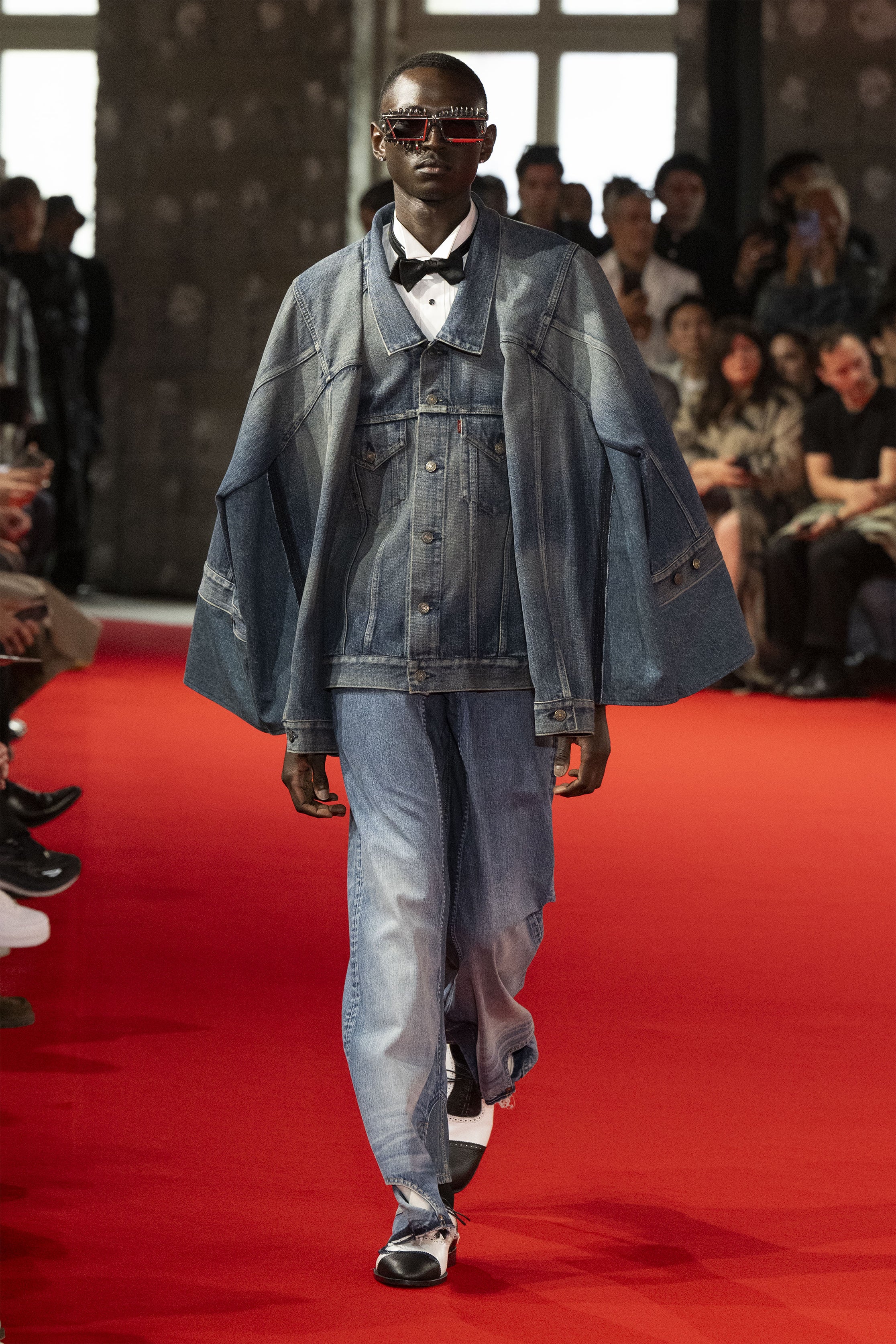 Fashion model wearing a JUNYA WATANABE MAN SS25 outfit