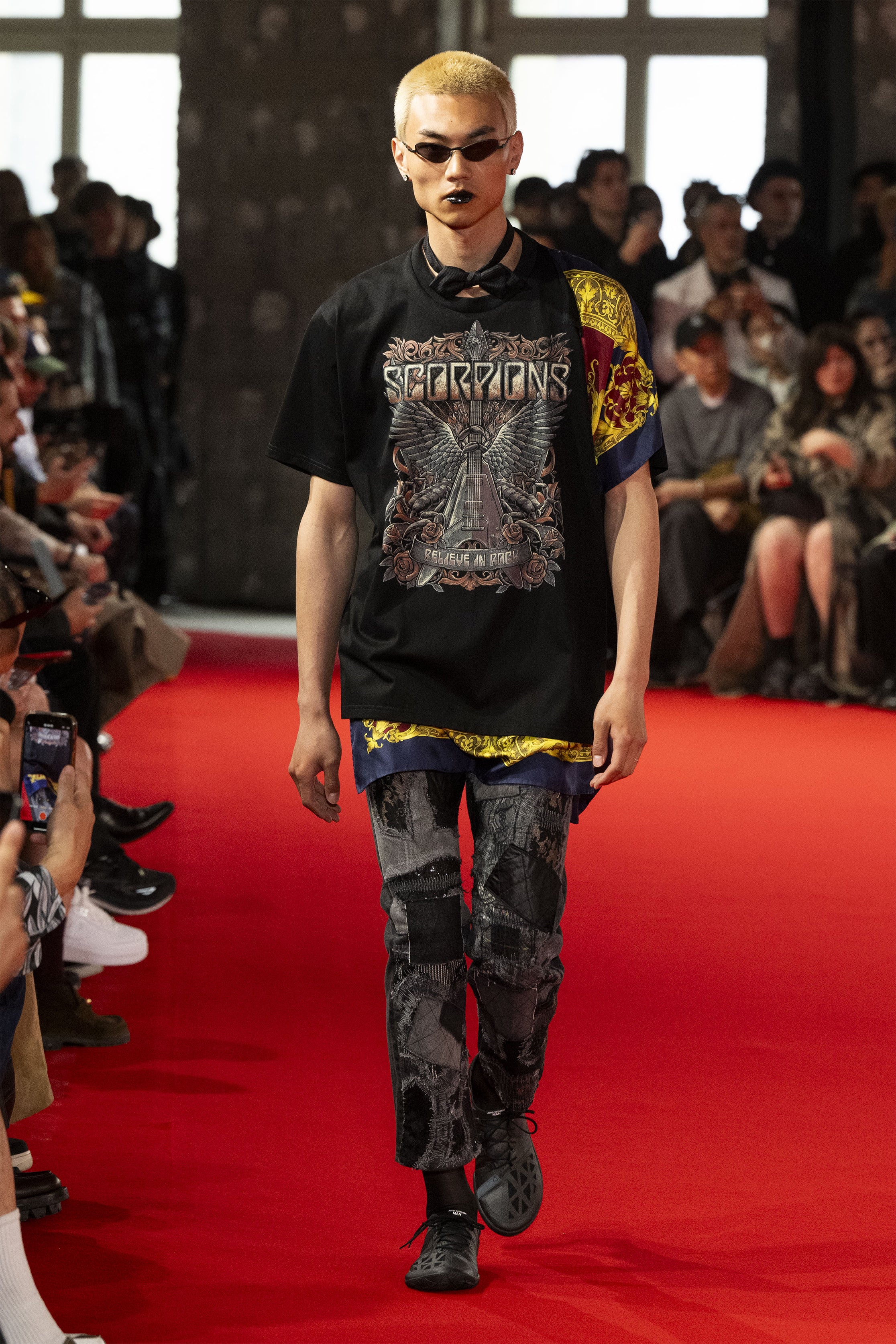 Fashion model wearing a JUNYA WATANABE MAN SS25 outfit