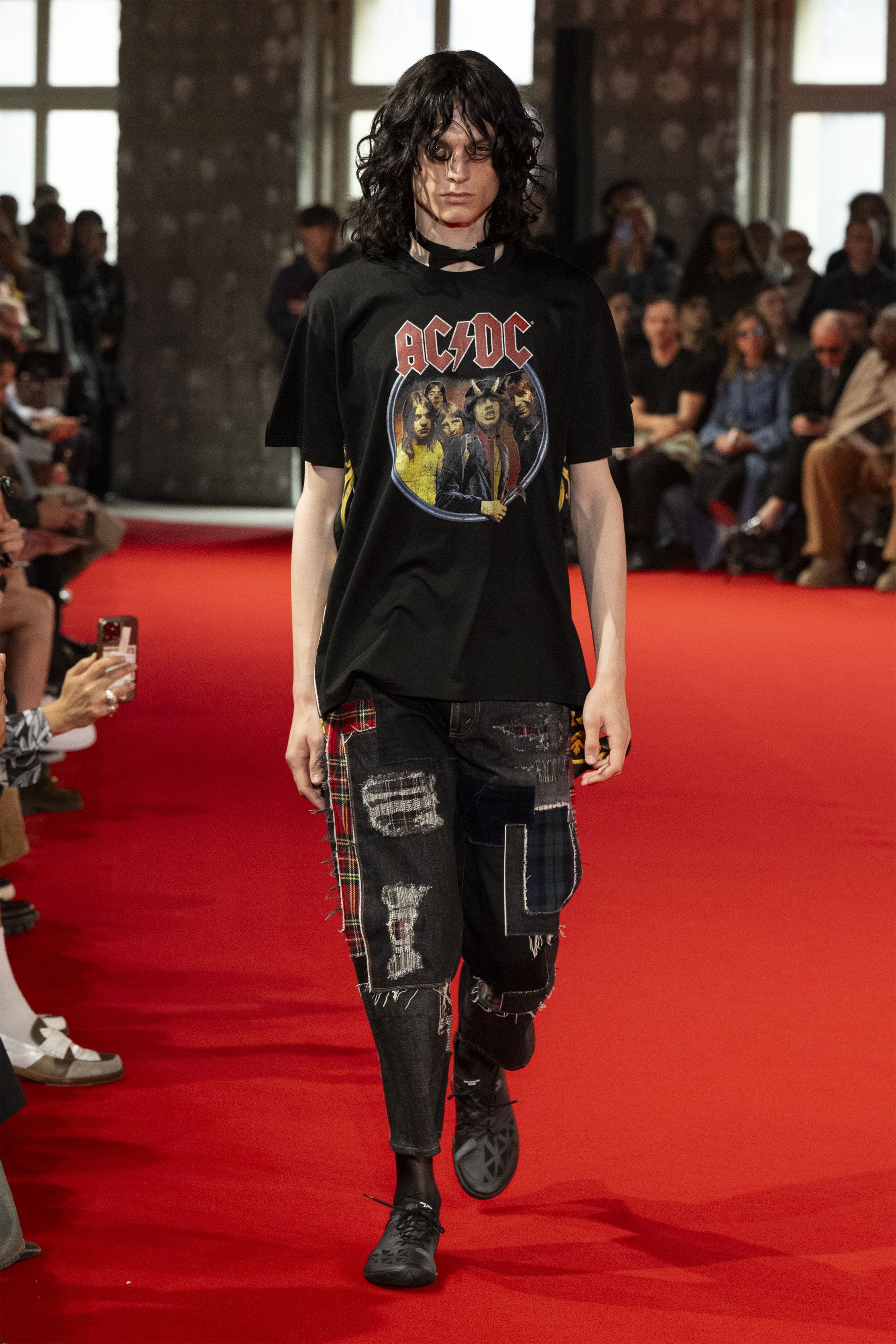 Fashion model wearing a JUNYA WATANABE MAN SS25 outfit