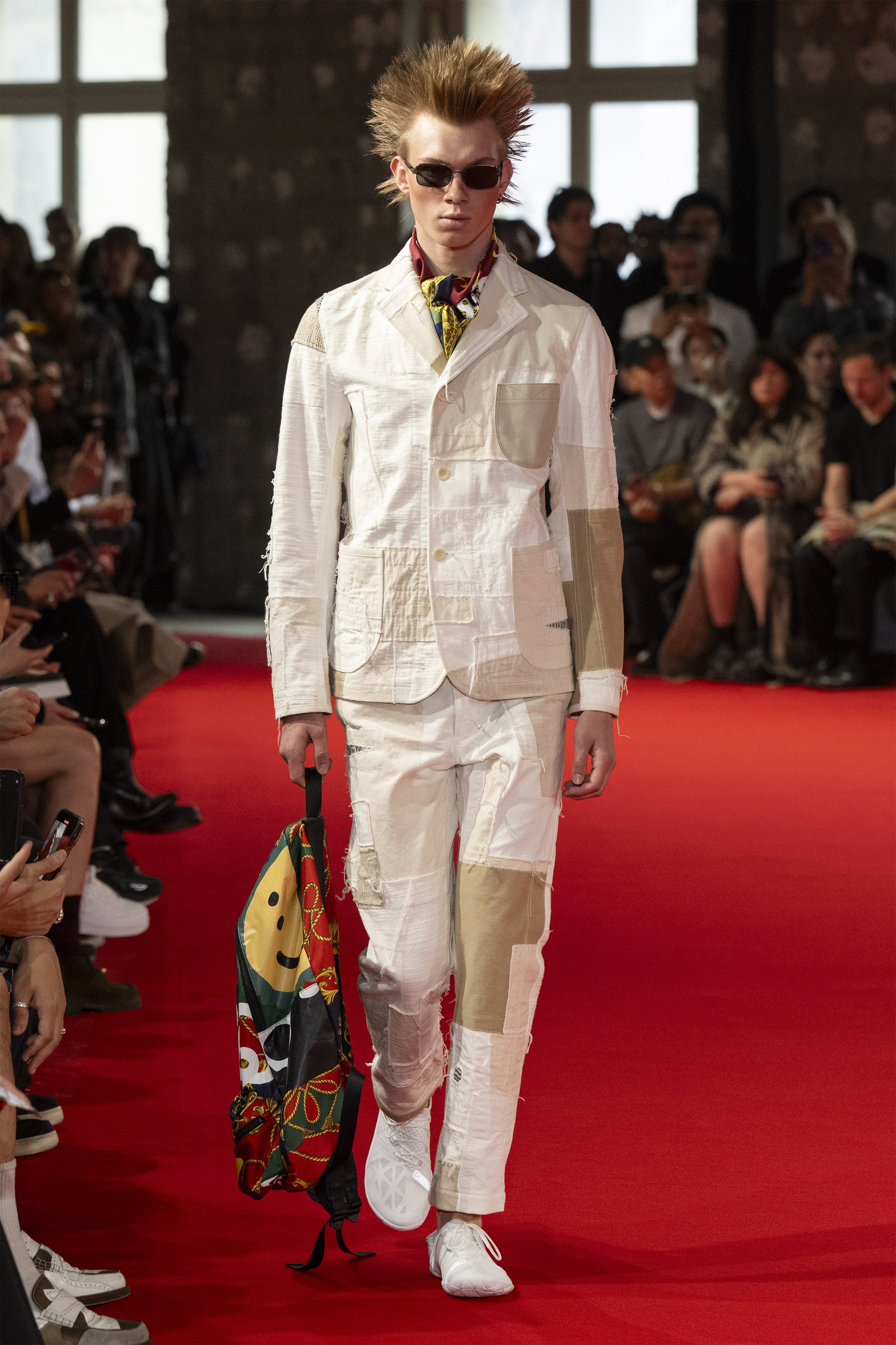 Fashion model wearing a JUNYA WATANABE MAN SS25 outfit