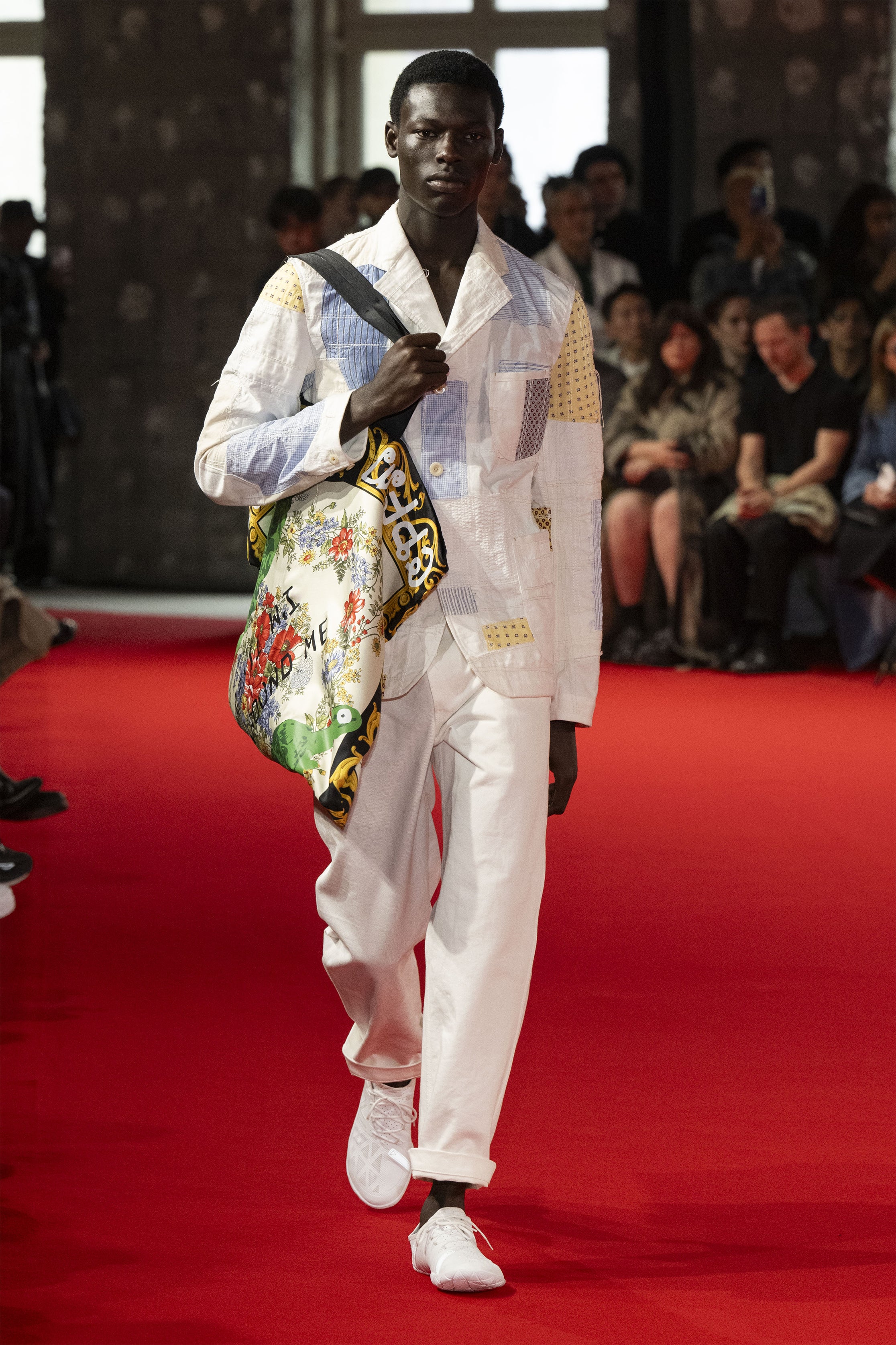 Fashion model wearing a JUNYA WATANABE MAN SS25 outfit