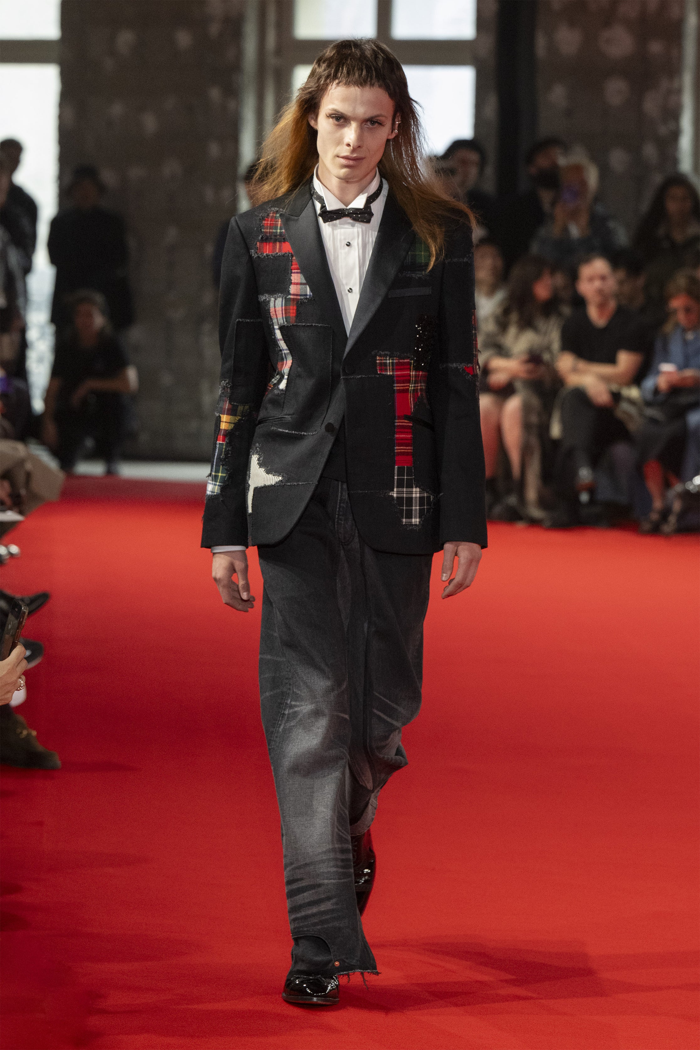 Fashion model wearing a JUNYA WATANABE MAN SS25 outfit