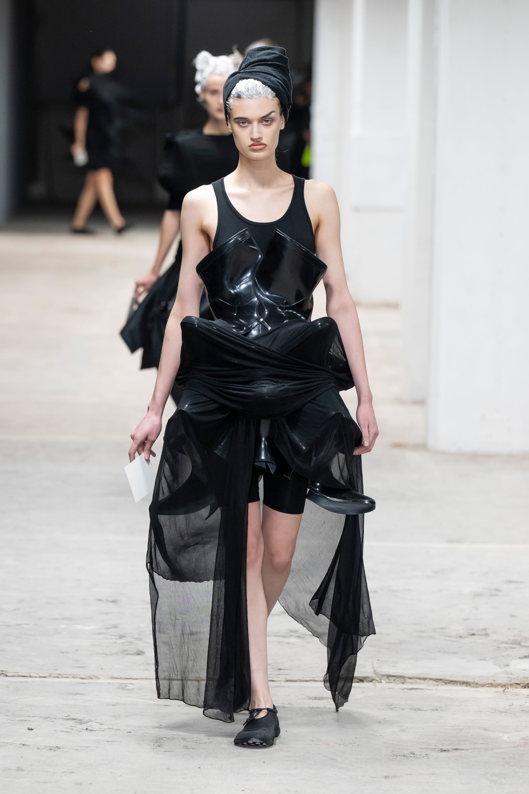 Fashion model wearing a Junya Watanabe SS26 outfit