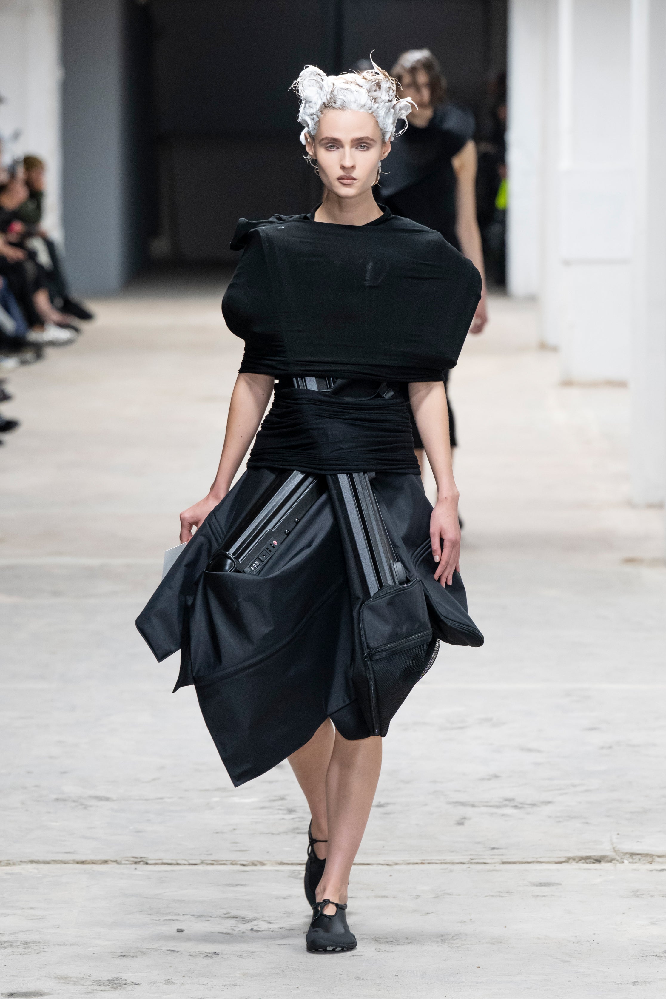 Fashion model wearing a Junya Watanabe SS26 outfit