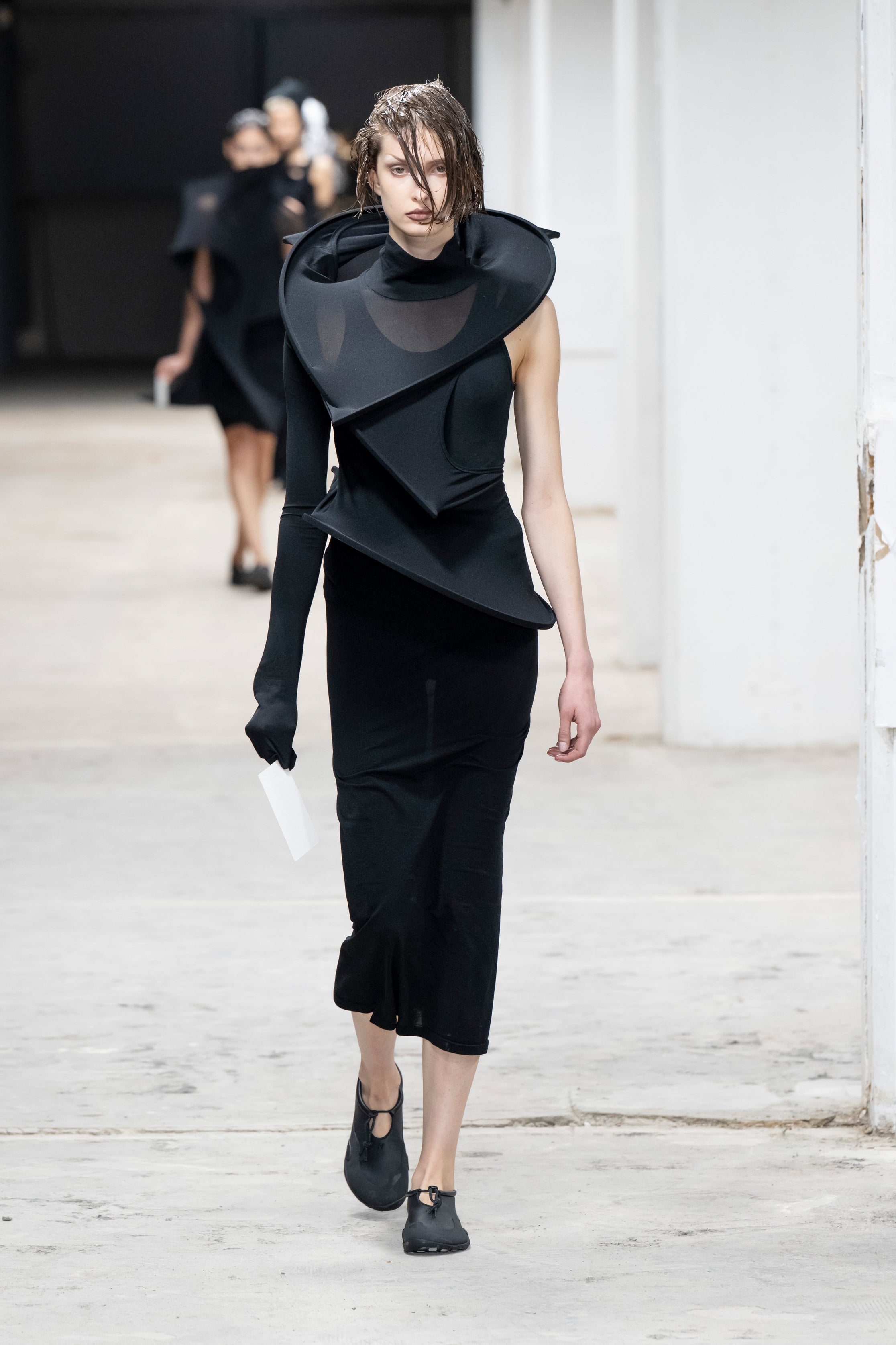 Fashion model wearing a Junya Watanabe SS26 outfit