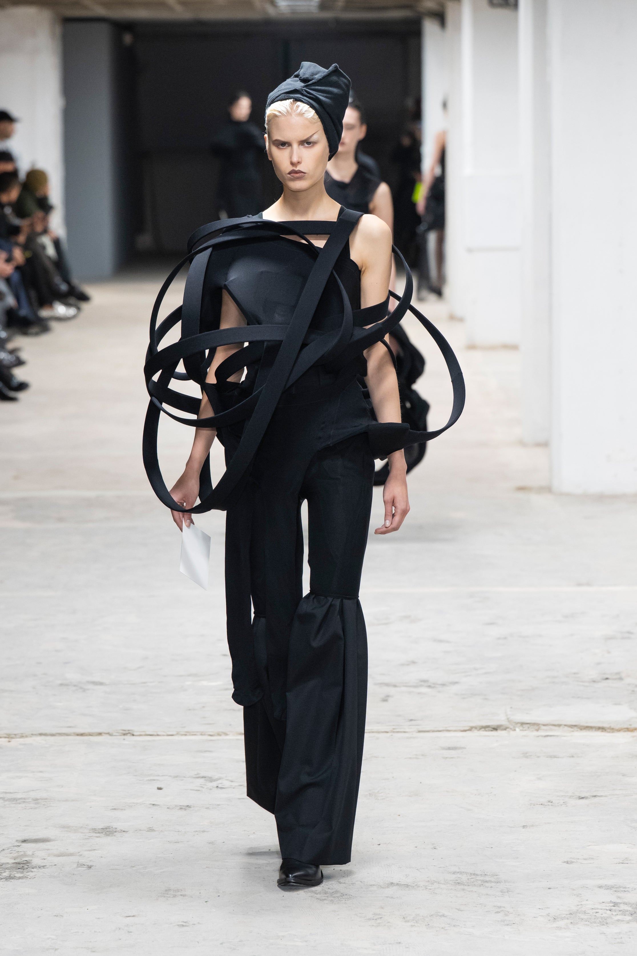 Fashion model wearing a Junya Watanabe SS26 outfit