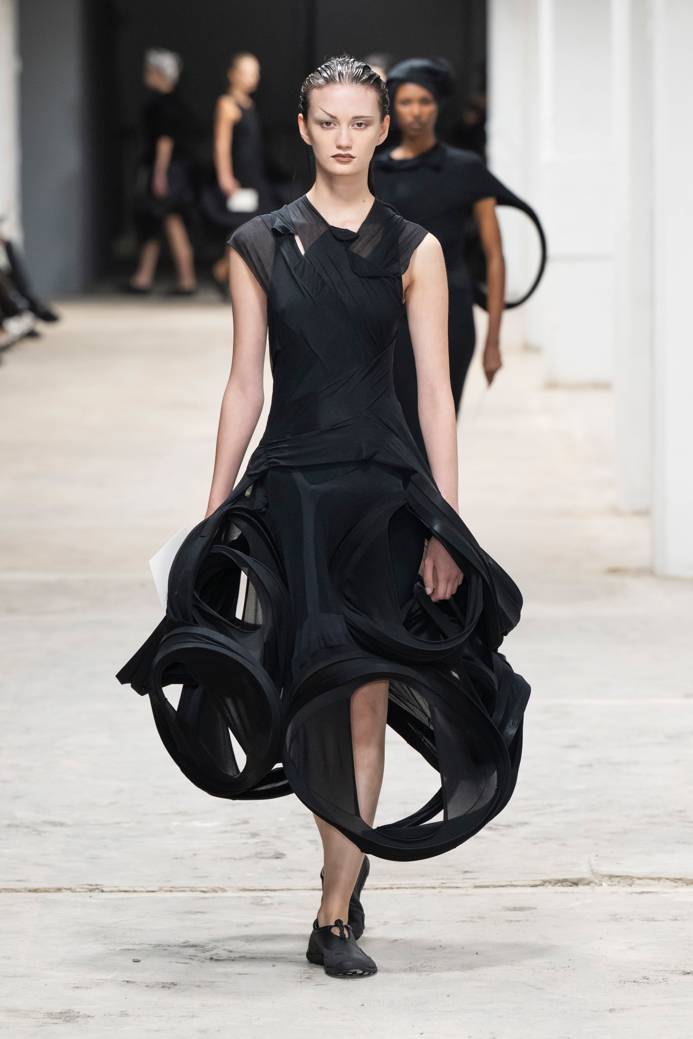 Fashion model wearing a Junya Watanabe SS26 outfit